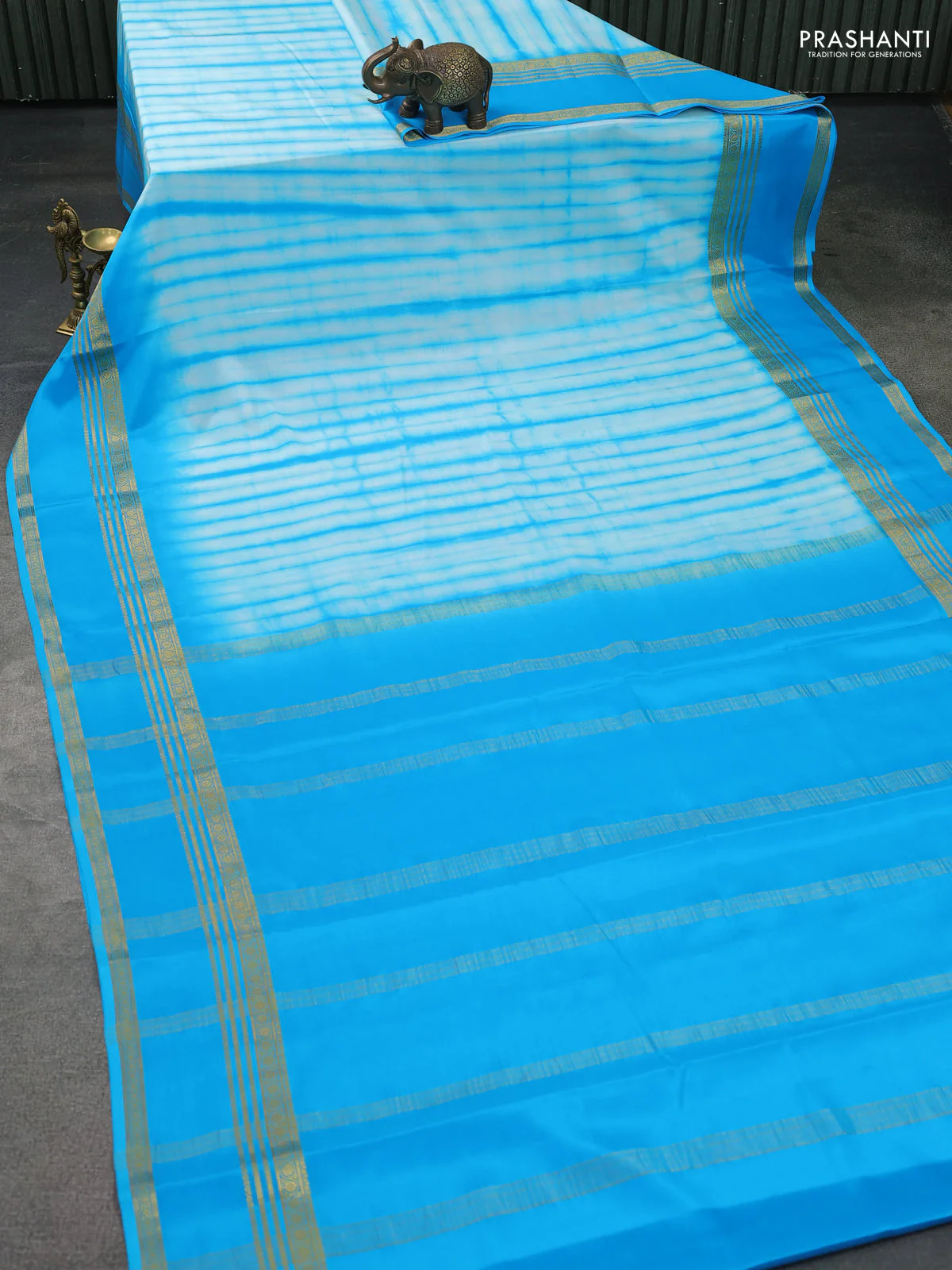 Pure mysore silk saree teal blue with allover shibori prints and rettapet zari woven border - Image 2