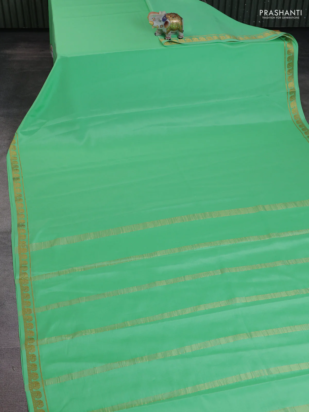 Pure mysore silk saree teal green with plain body and elephant zari woven border - Image 2