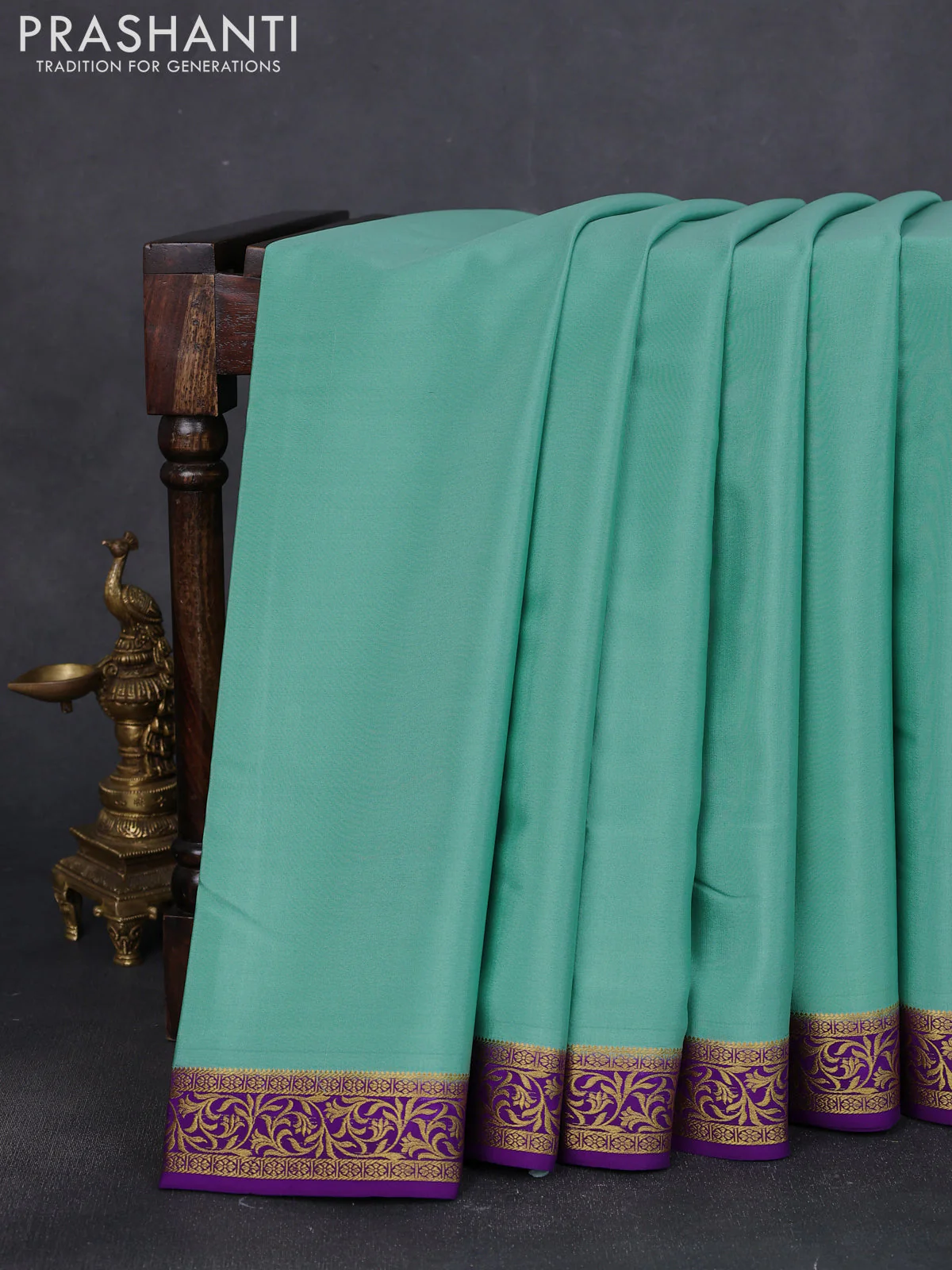 Pure mysore silk saree teal shade and violet with plain body and zari woven border