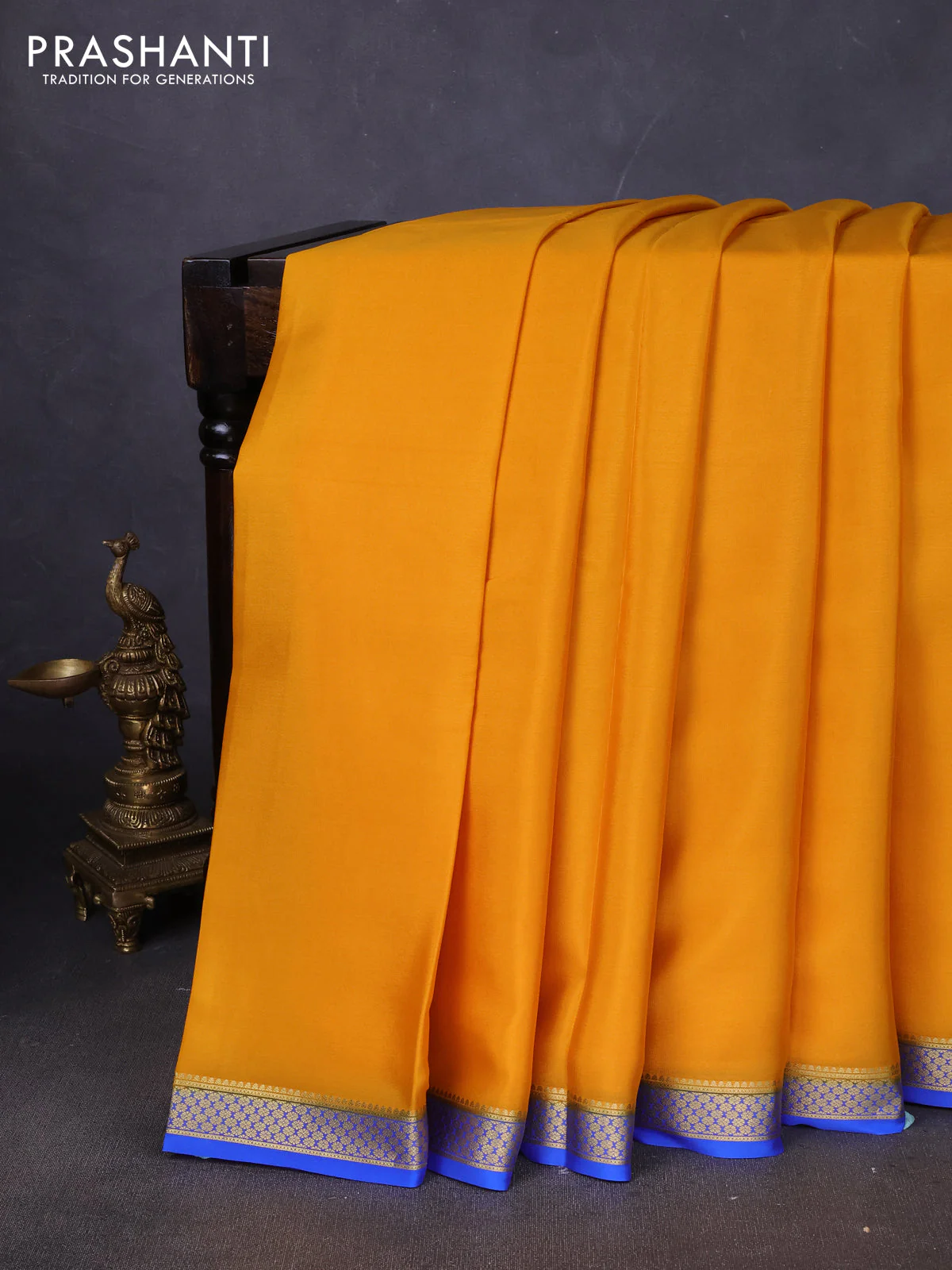 Pure mysore silk saree yellow and blue with plain body and zari woven border