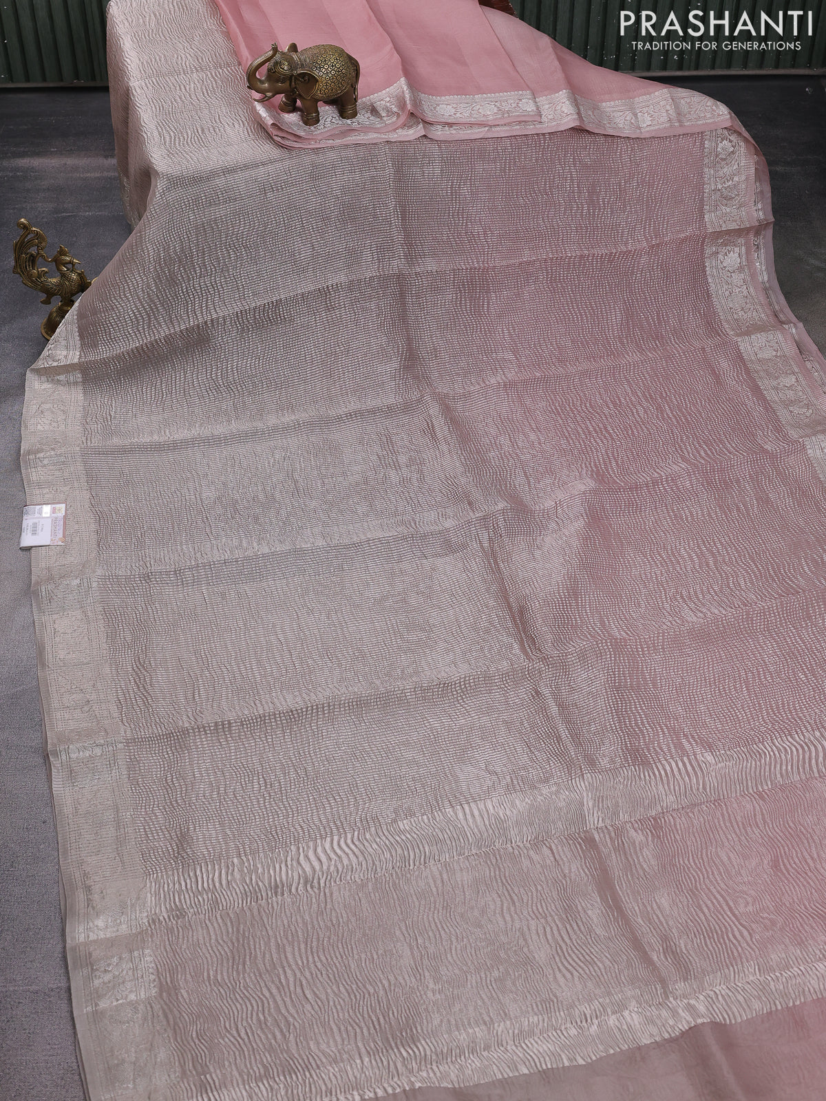 Pure organza partly silk saree grey shade and paste peach with allover silver zari weaves and silver zari woven border - Image 3