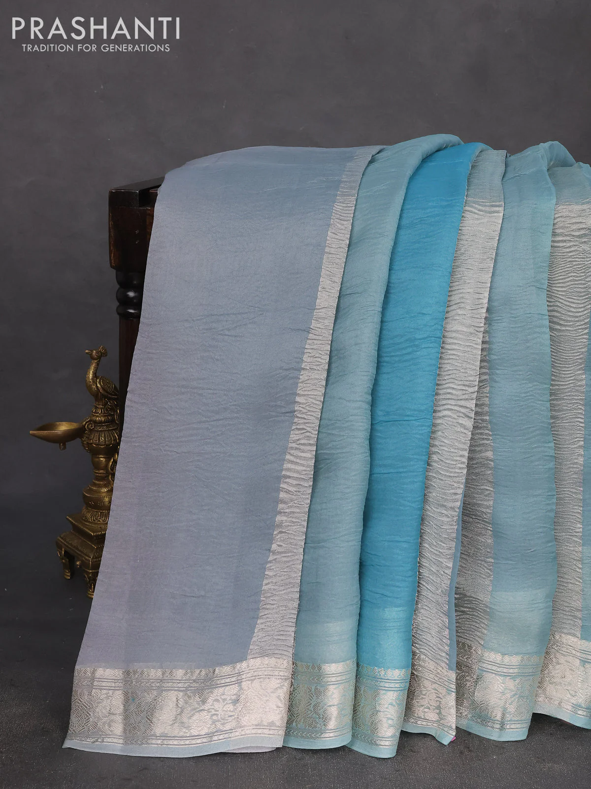 Pure organza partly silk saree pastel blue with allover silver zari weaves and silver zari woven border - Image 2