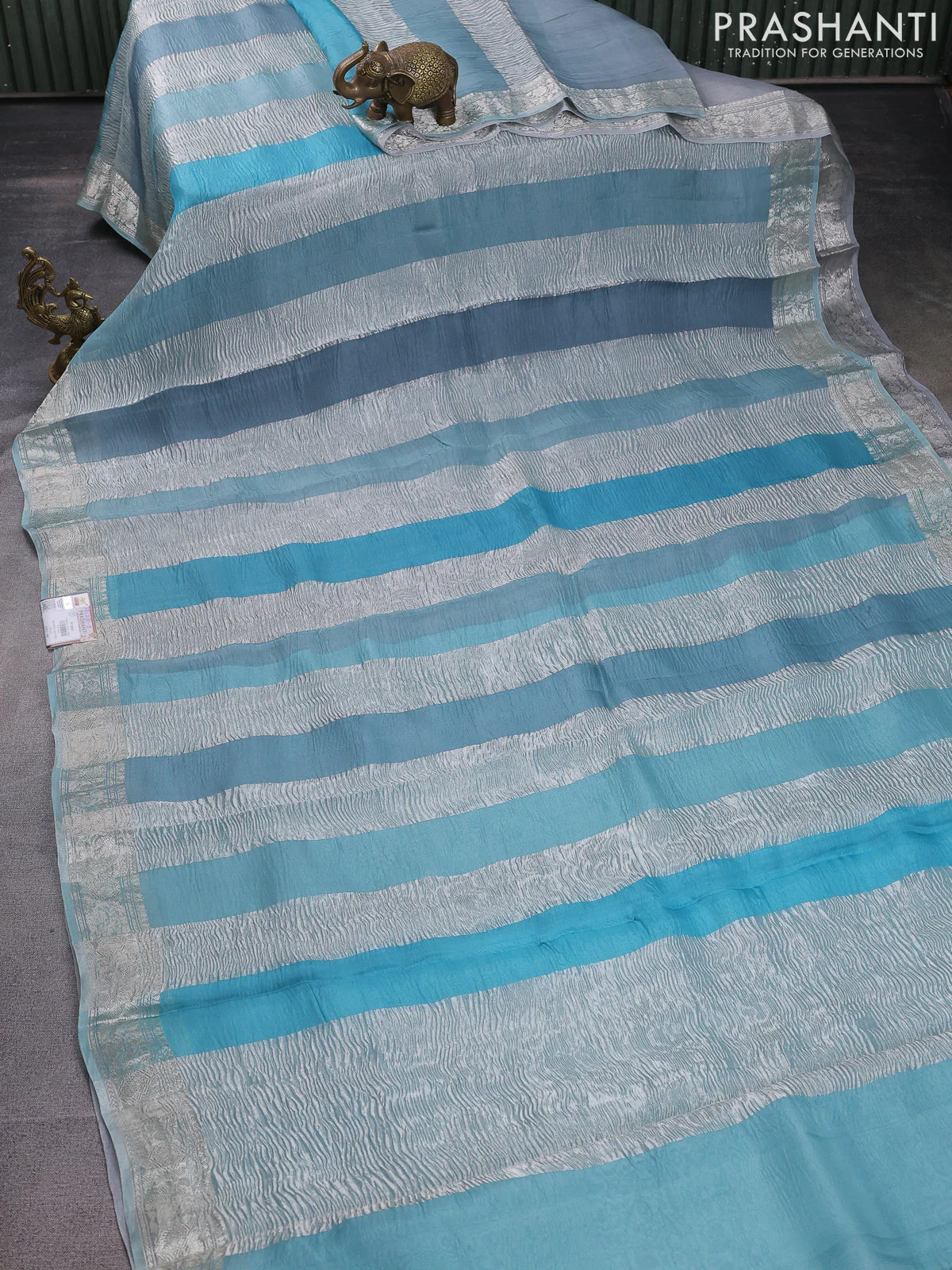 Pure organza partly silk saree pastel blue with allover silver zari weaves and silver zari woven border - Image 3