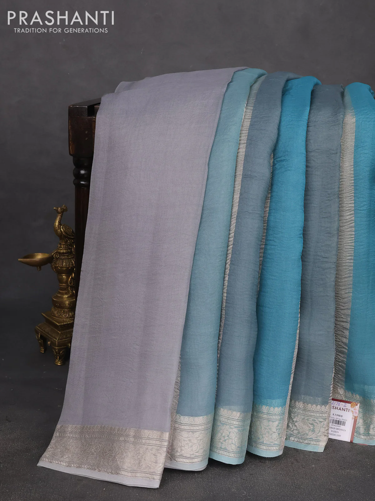 Pure organza partly silk saree pastel blue with silver zari stripe pattern and silver zari woven border - Image 2