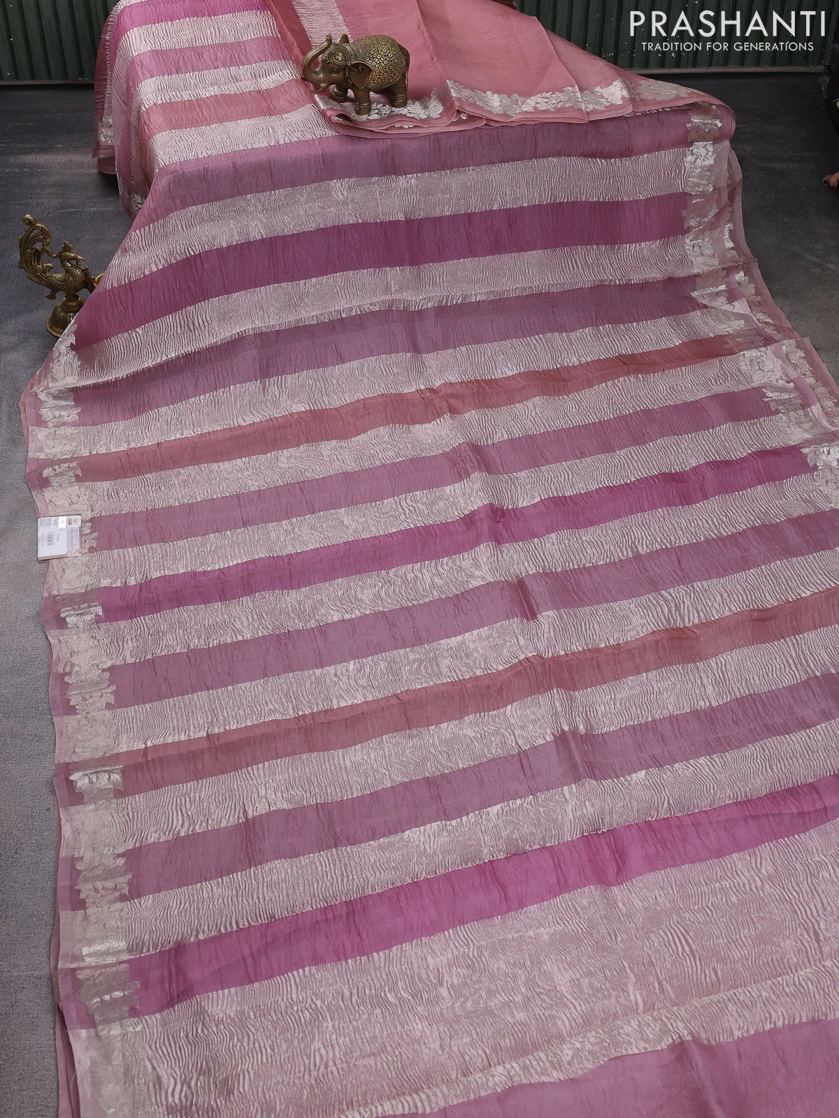 Pure organza partly silk saree pastel pink and pastel peach with silver zari stripe pattern and silver zari woven floral border - Image 3