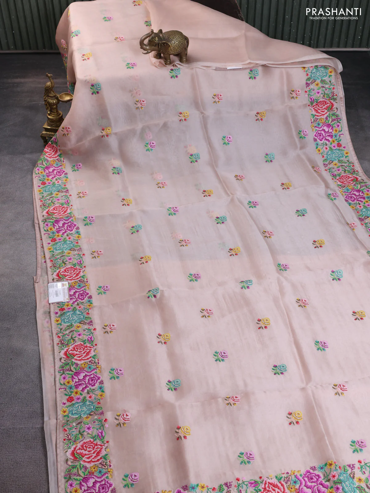 Pure organza silk saree beige with embroidery buttas and petite embroidery border - Image 2