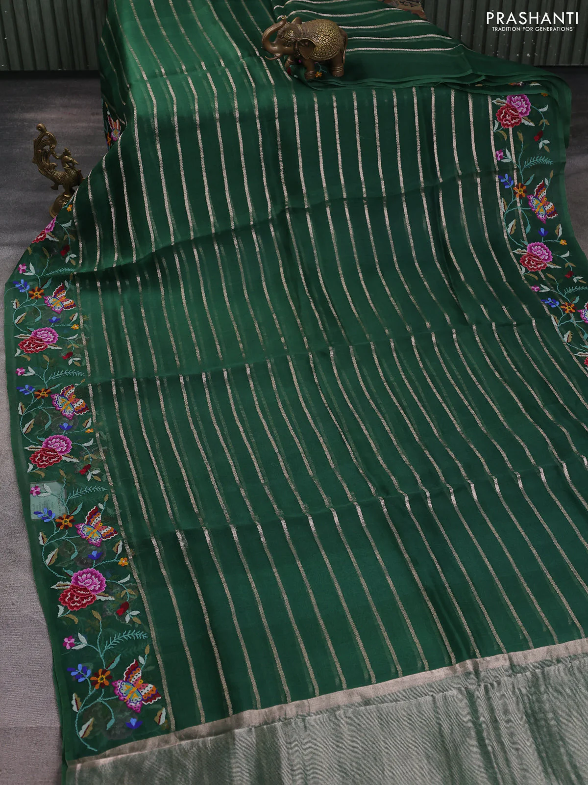 Pure organza silk saree bottle green with allover zari weaves and floral embroidery border - Image 2