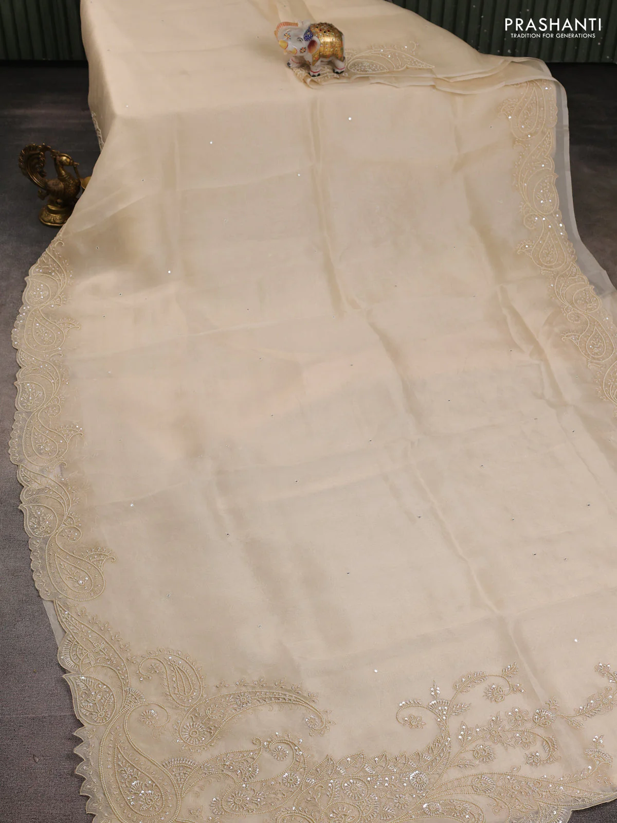 Pure organza silk saree cream with mirror embroidery buttas and embroidered beaded border - Image 2
