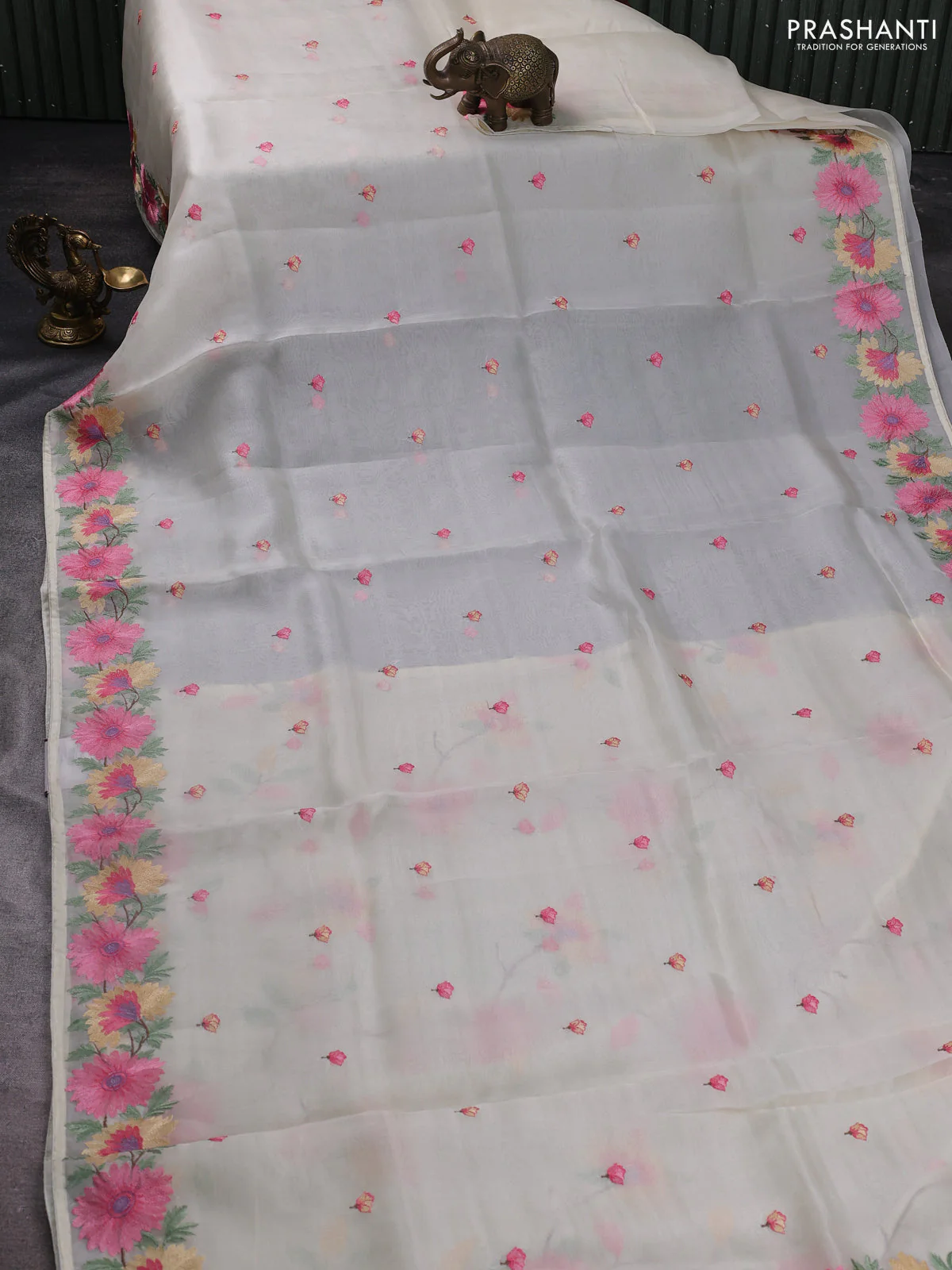 Pure organza silk saree cream with thread woven embroidery buttas and floral embroidery border - Image 2