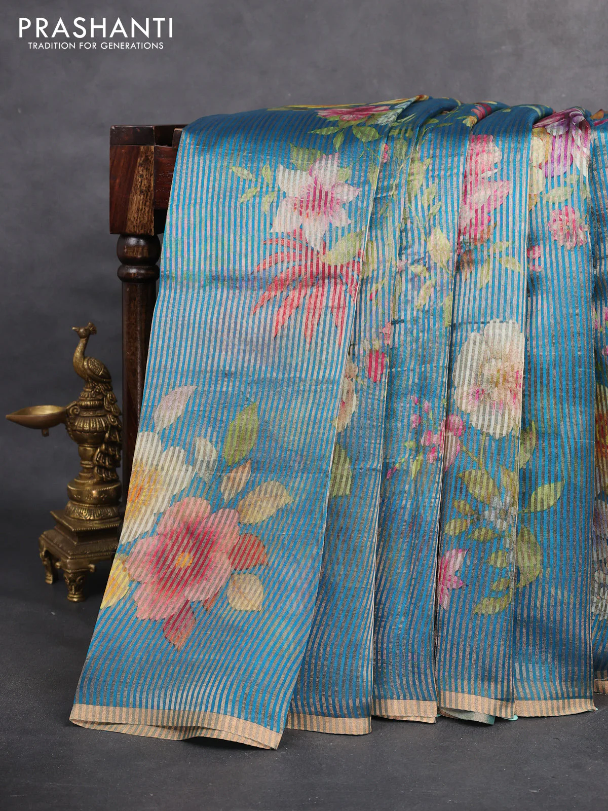 Pure organza silk saree cs blue with floral digital prints & zari stripe pattern and zari woven piping border