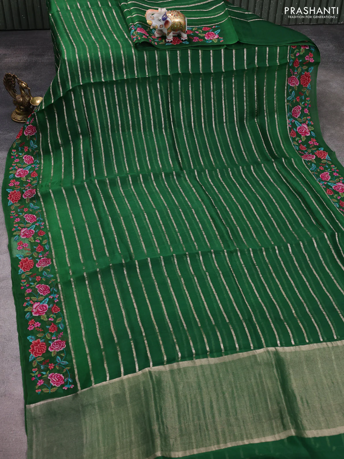 Pure organza silk saree green with allover zari weaves and floral embroidery border - Image 2