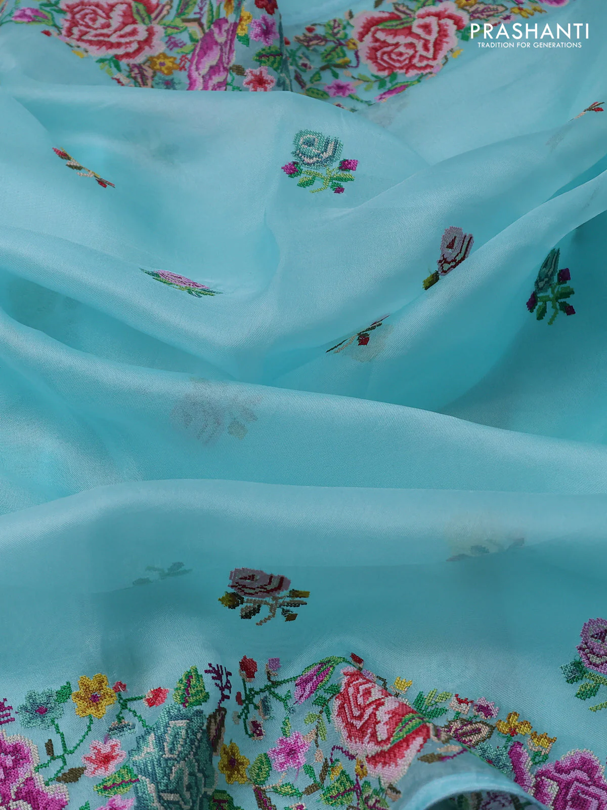 Pure organza silk saree light blue with embroidery work buttas and floral design embroidery border - Image 3