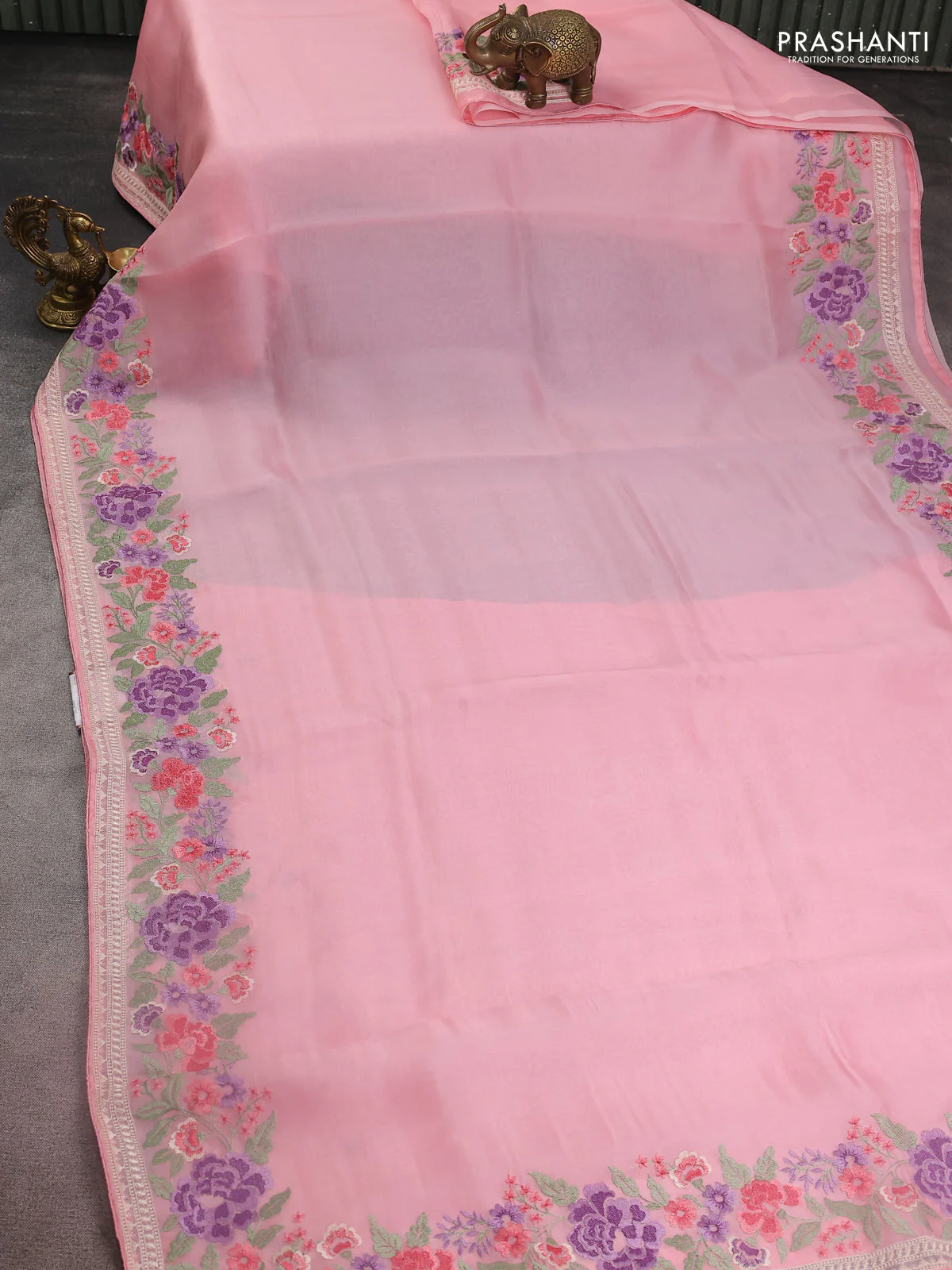 Pure organza silk saree light pink with plain body and floral design embroidery work border - Image 2