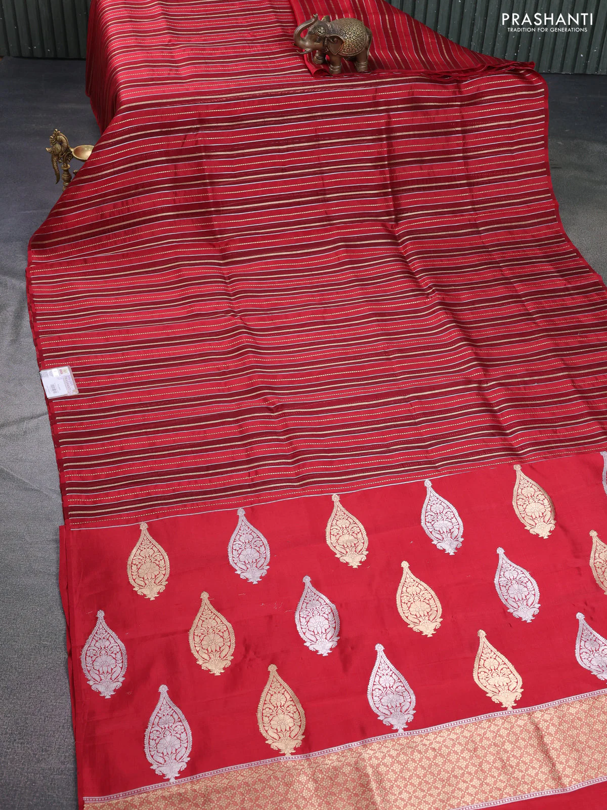 Pure organza silk saree maroon and red with allover zari woven stripes pattern in borderless style - Image 2