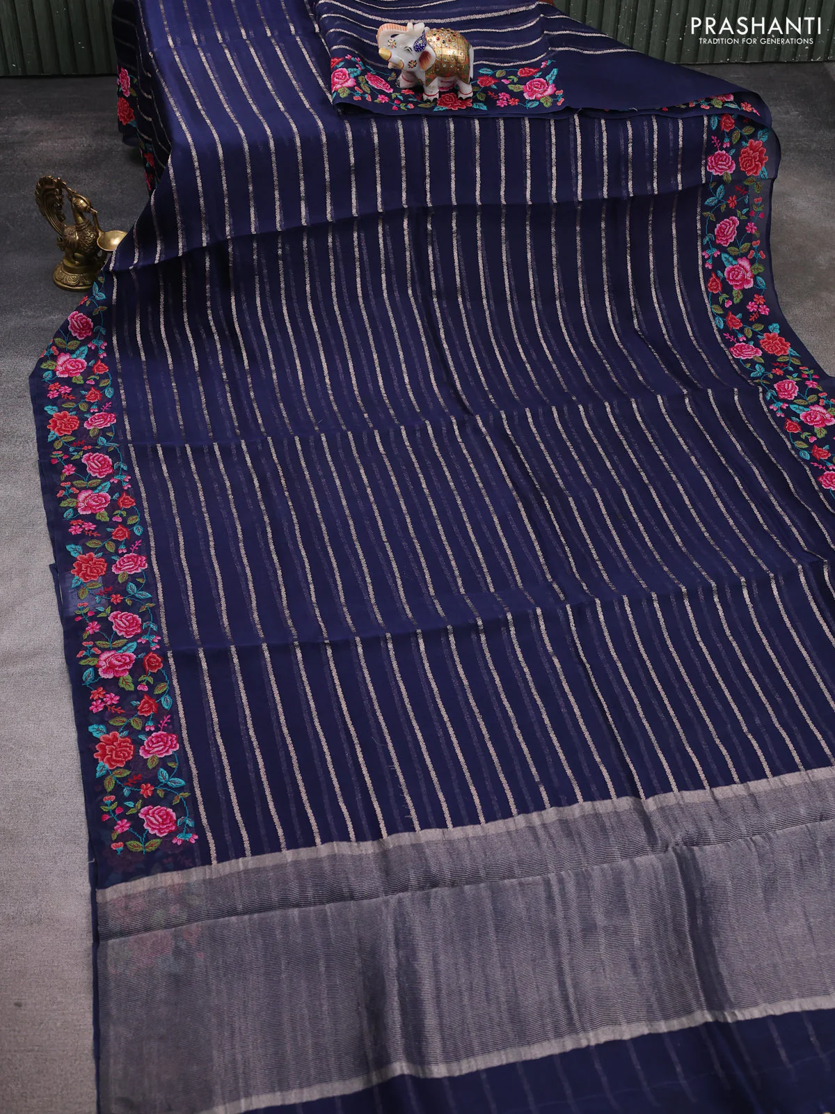 Pure organza silk saree navy blue with allover zari weaves and floral embroidery border - Image 2