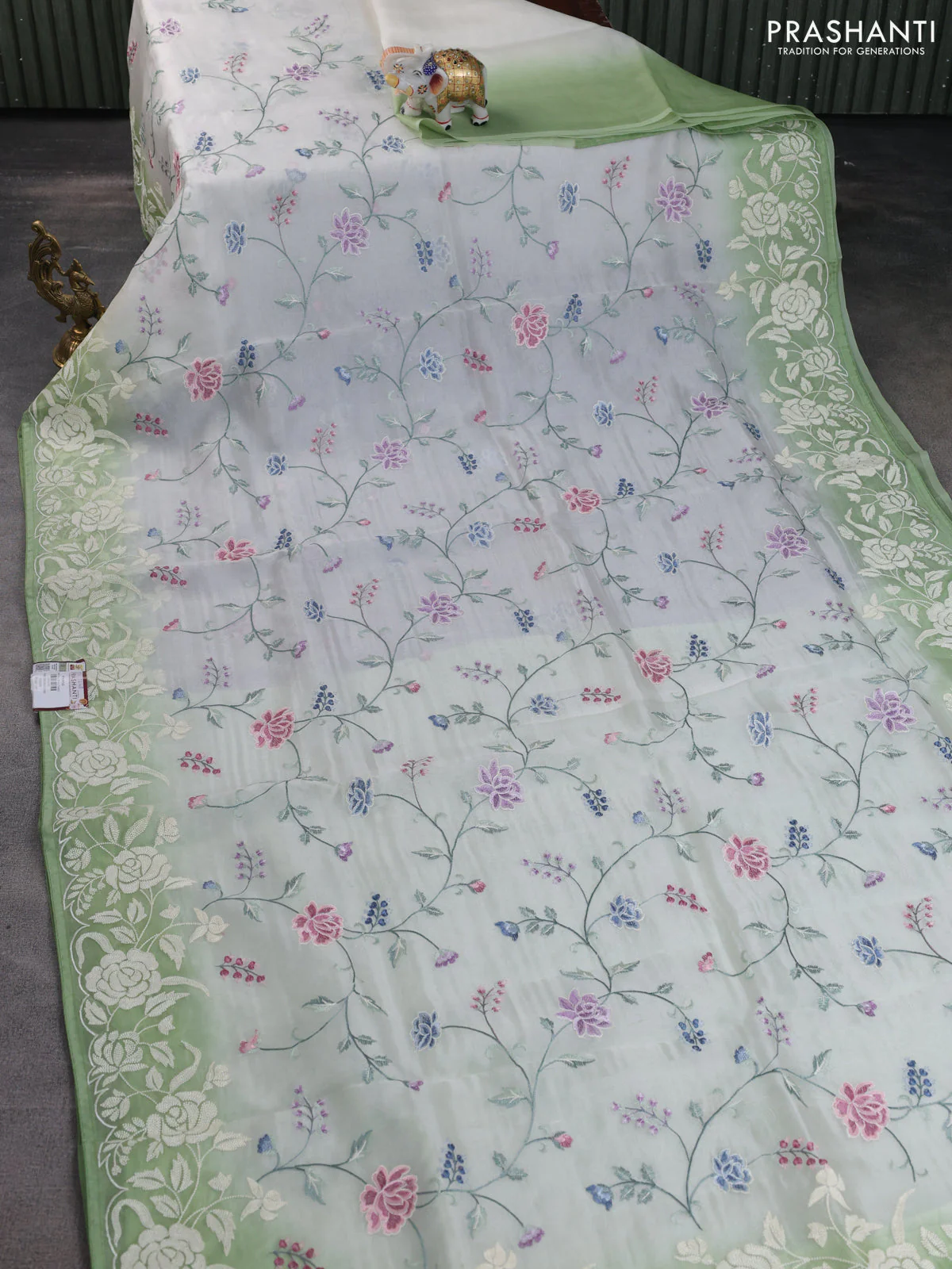 Pure organza silk saree off white and pastel green with allover floral embroidery - Image 2