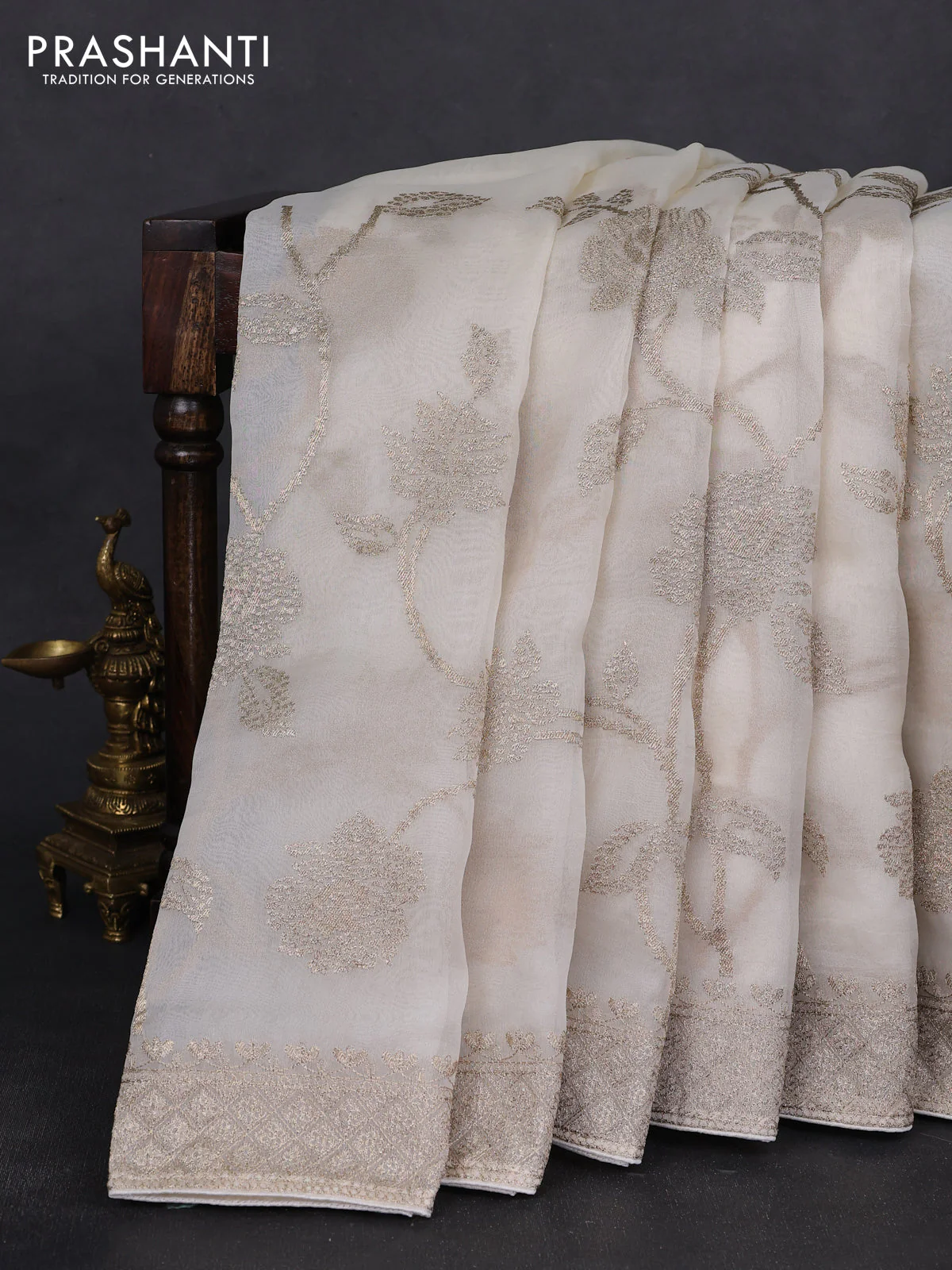 Pure organza silk saree off white with allover embroidery work and embroidered border