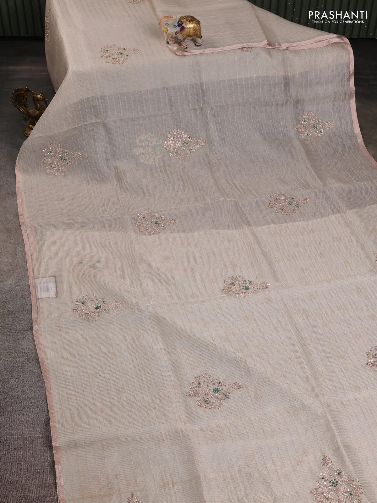 Pure organza silk saree off white with allover zari stripe pattern & zardosi work and zari woven piping border - Image 2
