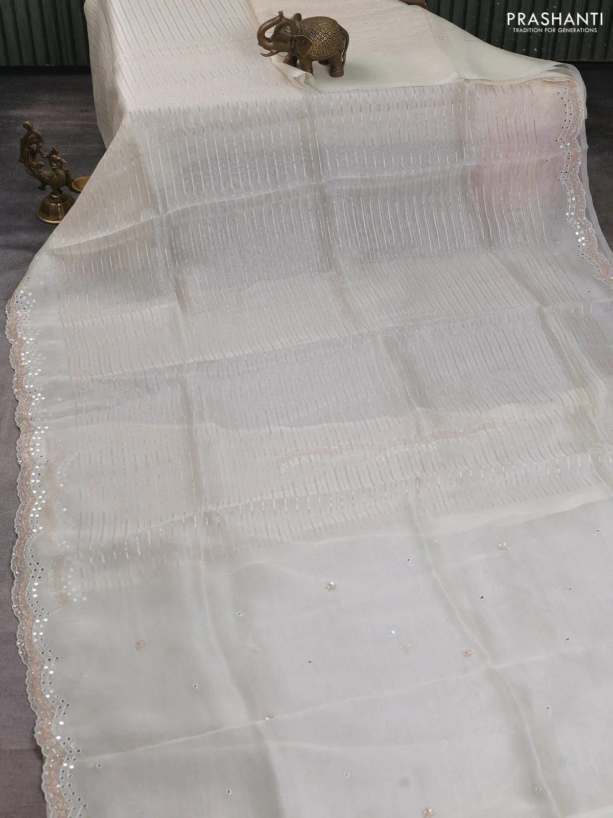 Pure organza silk saree off white with allover zari weaves and sequin mirror work border - Image 2
