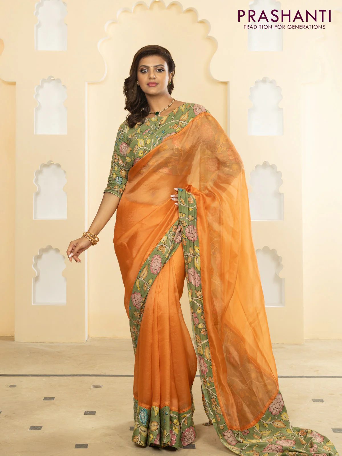 Pure organza silk saree orange and pastel green with plain body and kalamkari printed pita work border - Image 3