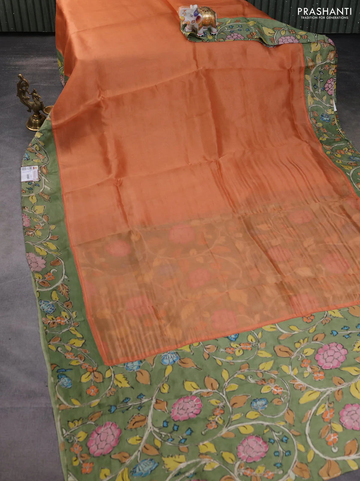 Pure organza silk saree orange and pastel green with plain body and kalamkari printed pita work border - Image 7