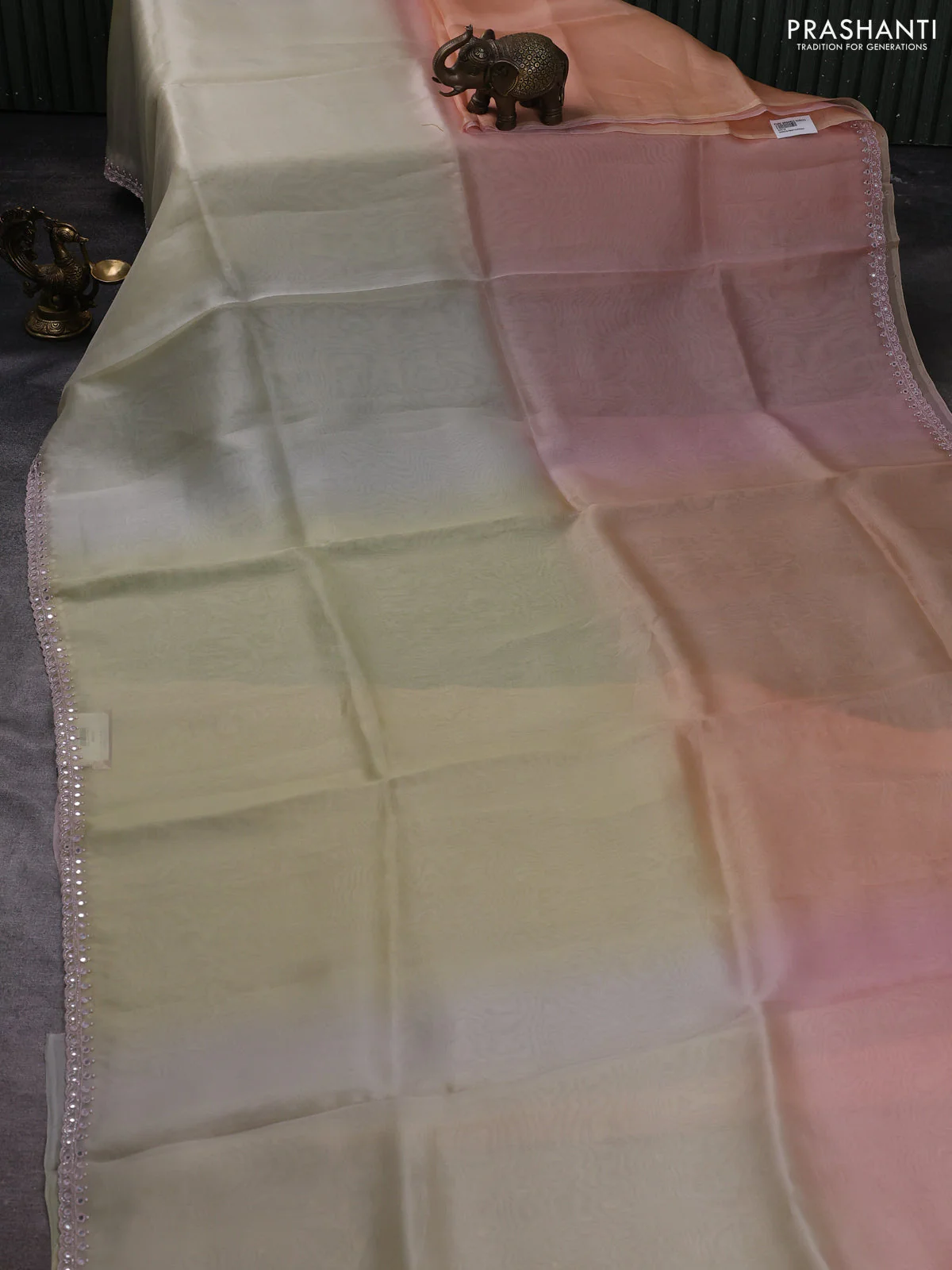 Pure organza silk saree pale yellow and peach with plain body and embroidery mirror work border - Image 2