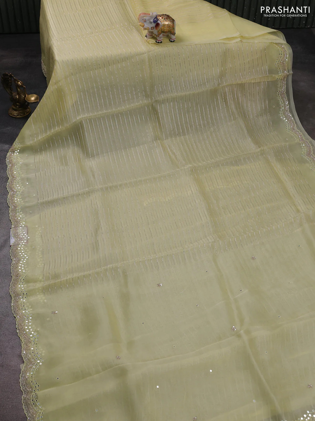 Pure organza silk saree pale yellow with allover zari weaves and sequin mirror work border - Image 2