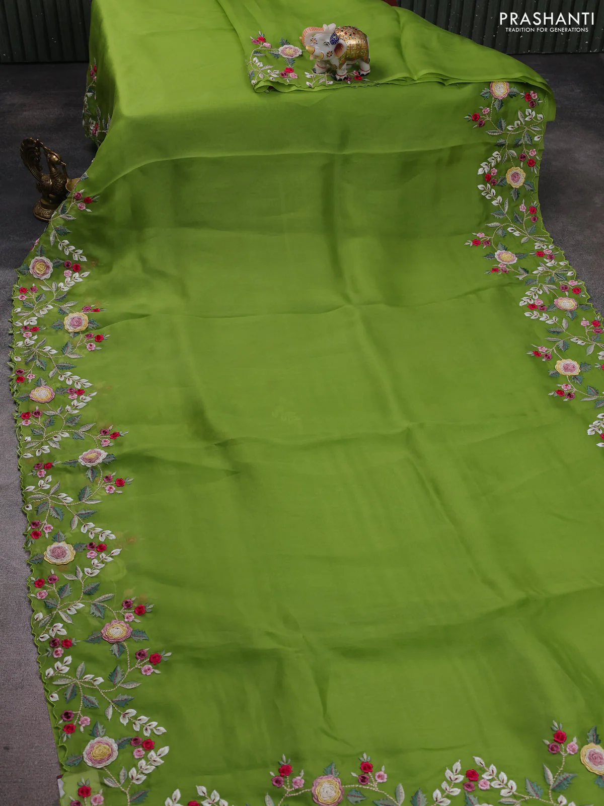 Pure organza silk saree parrot green with plain body and floral embroidery border - Image 2