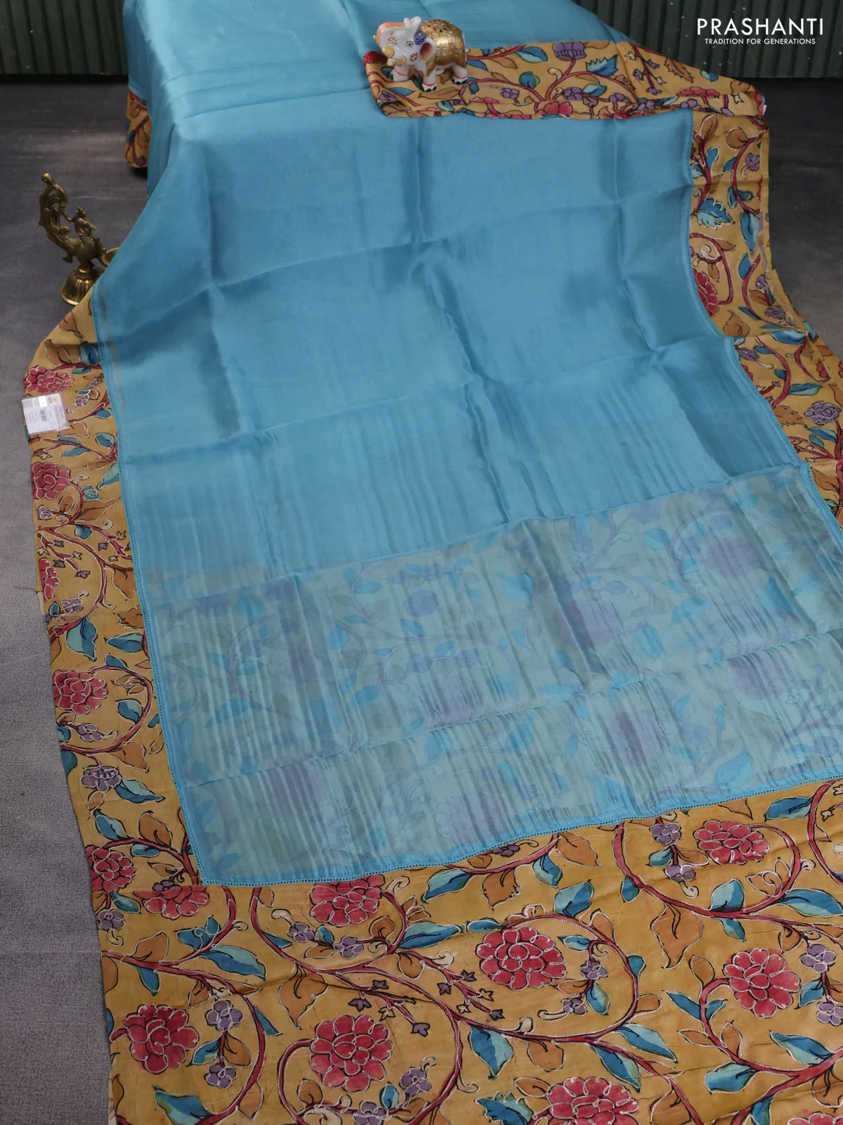 Pure organza silk saree pastel blue and sandal with plain body and kalamkari printed pita work border - Image 7