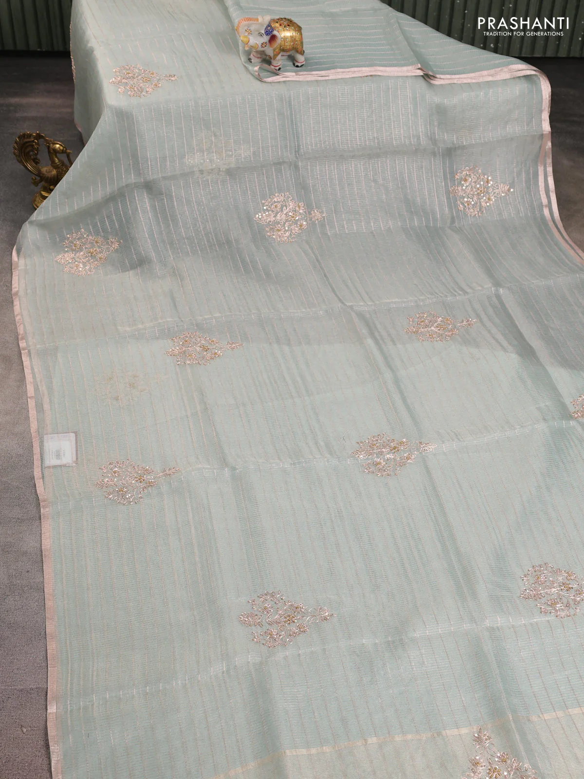 Pure organza silk saree pastel blue shade with allover zari stripe pattern & zardosi work and zari woven piping border - Image 2