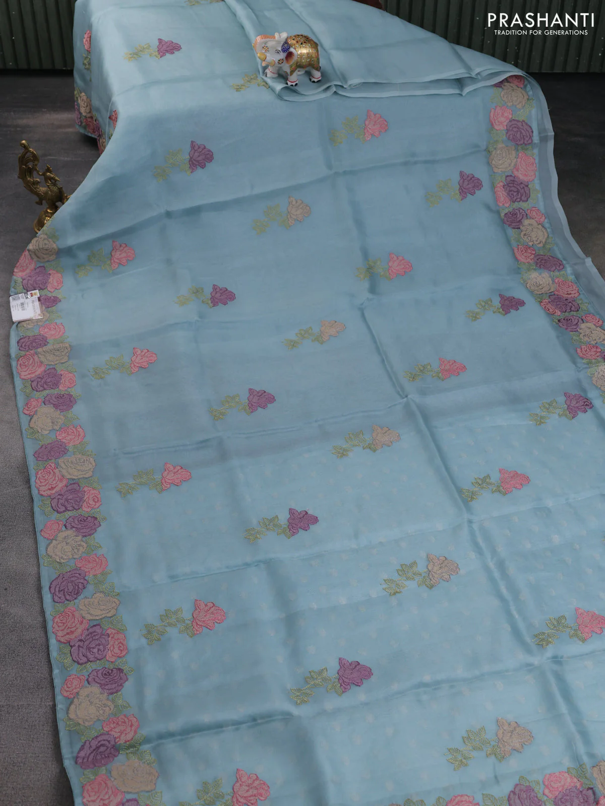 Pure organza silk saree pastel blue with floral embroidery buttas and floral embroidery border - Image 2