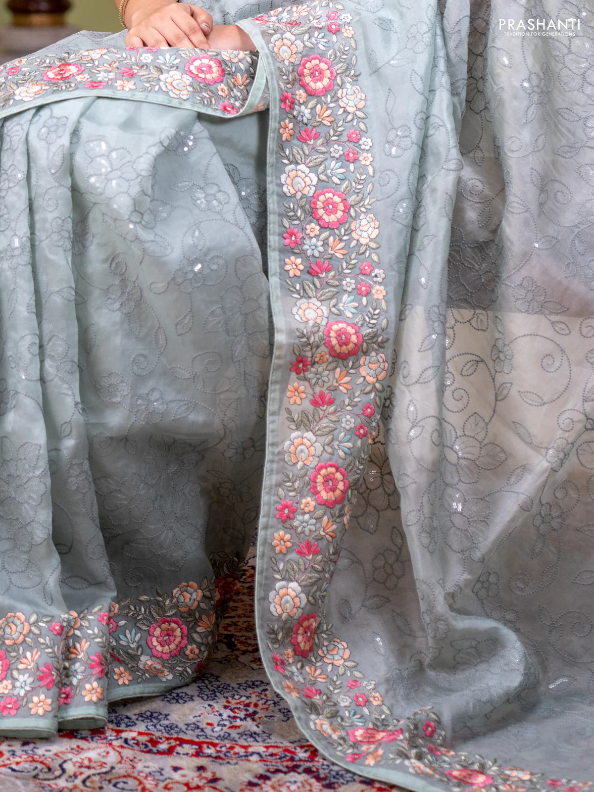 Pure organza silk saree pastel green with allover embroidery work and floral embroidery border - Image 2