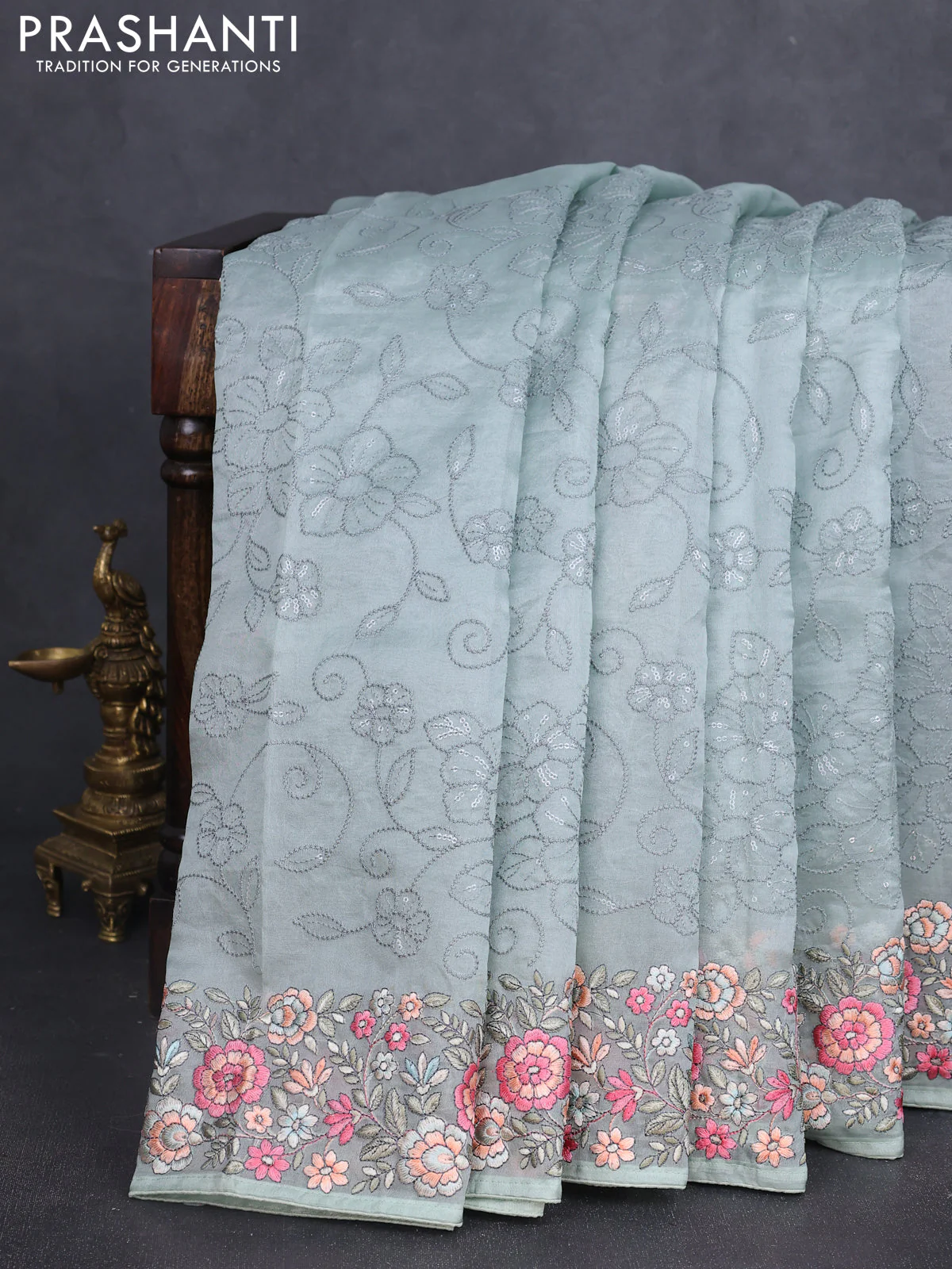 Pure organza silk saree pastel green with allover embroidery work and floral embroidery border - Image 3