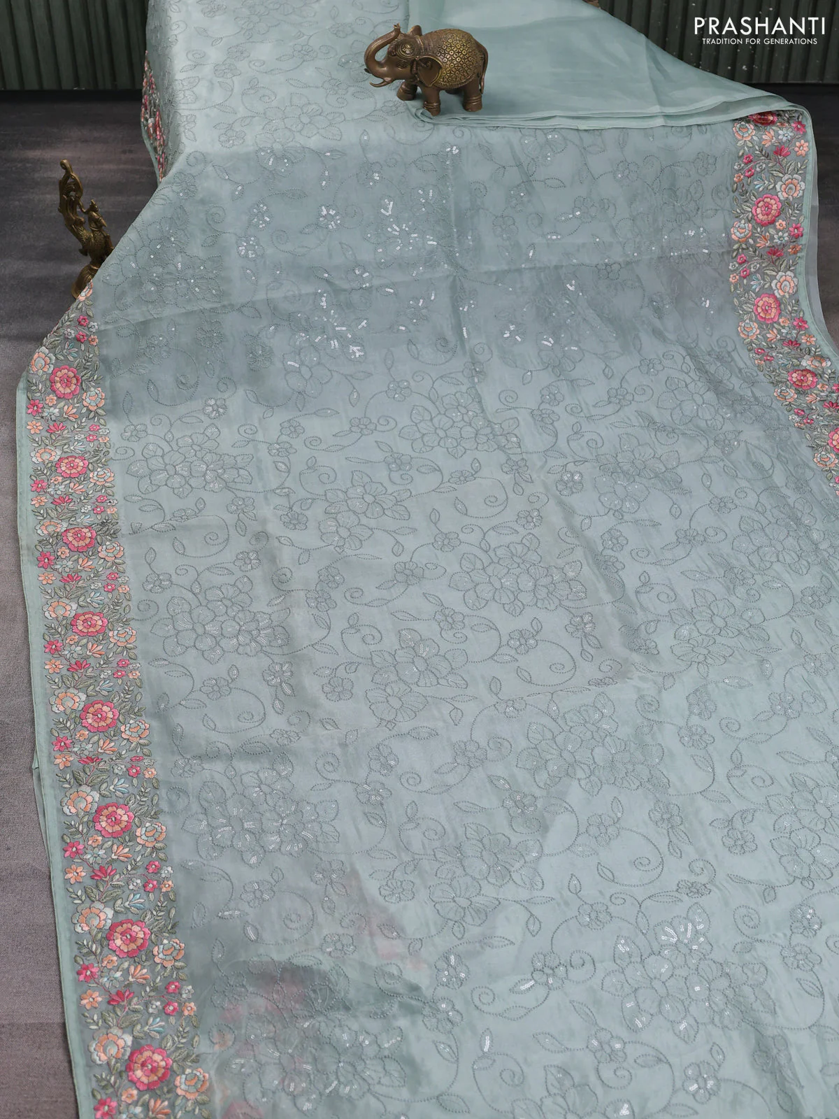 Pure organza silk saree pastel green with allover embroidery work and floral embroidery border - Image 4