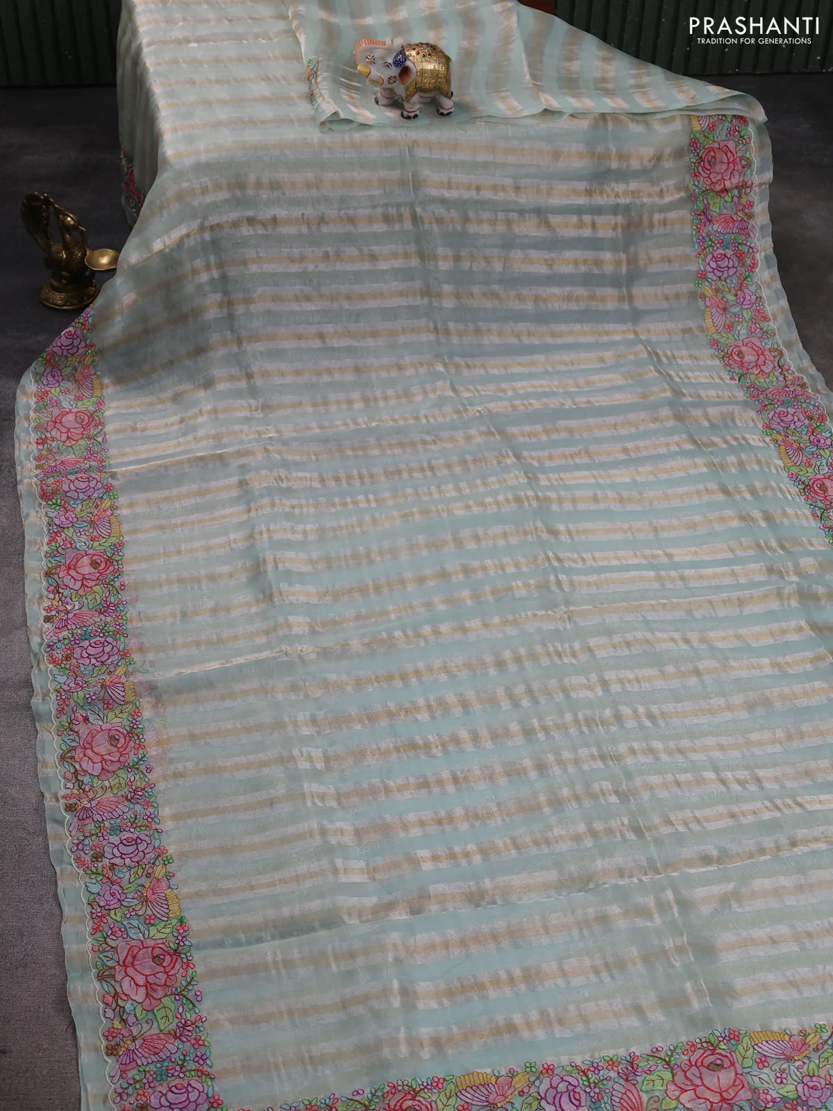 Pure organza silk saree pastel green with allover silver & zari stripes pattern and floral embroidery border - Image 2