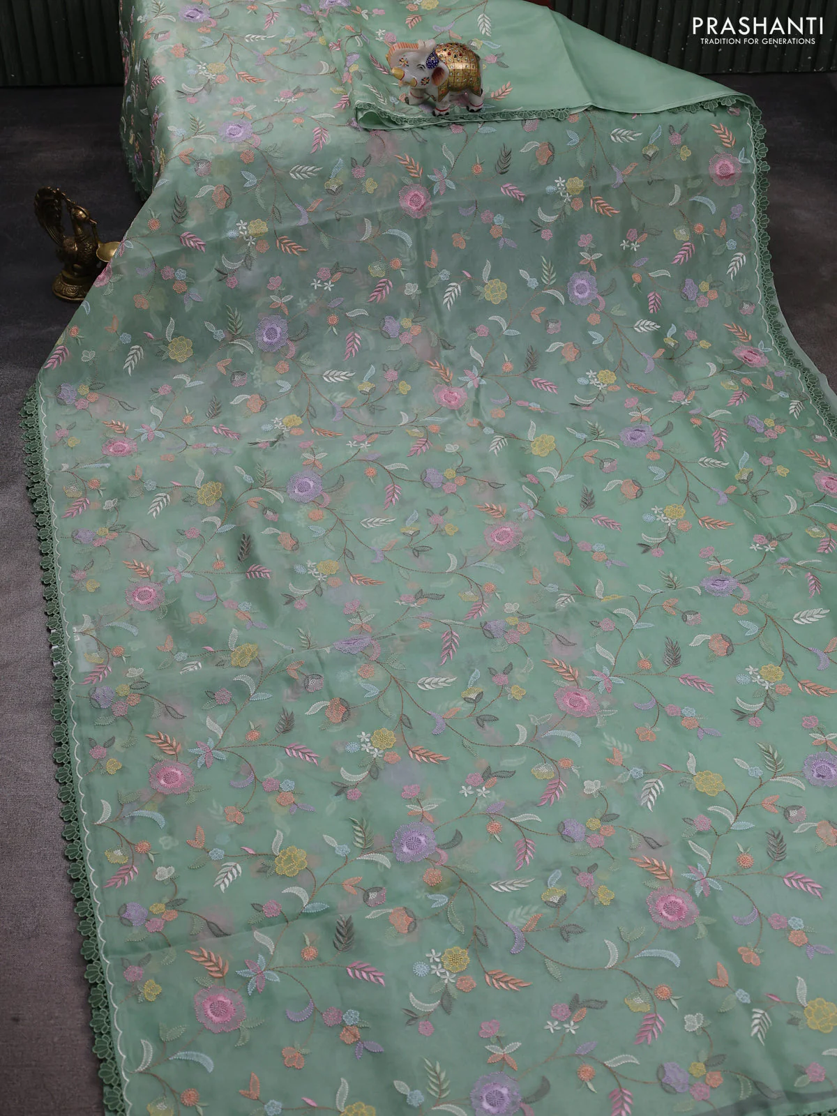 Pure organza silk saree pastel green with floral embroidery work and lace work border - Image 2