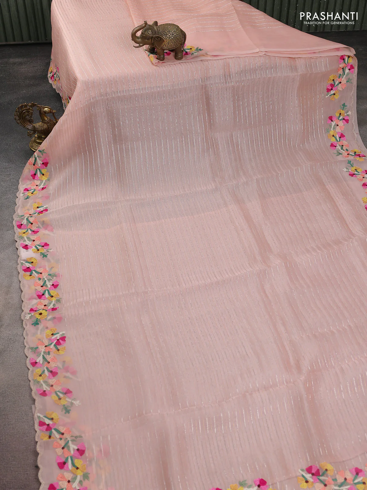 Pure organza silk saree pastel peach with allover silver & gold zari weaves and floral design embroidery border - Image 2