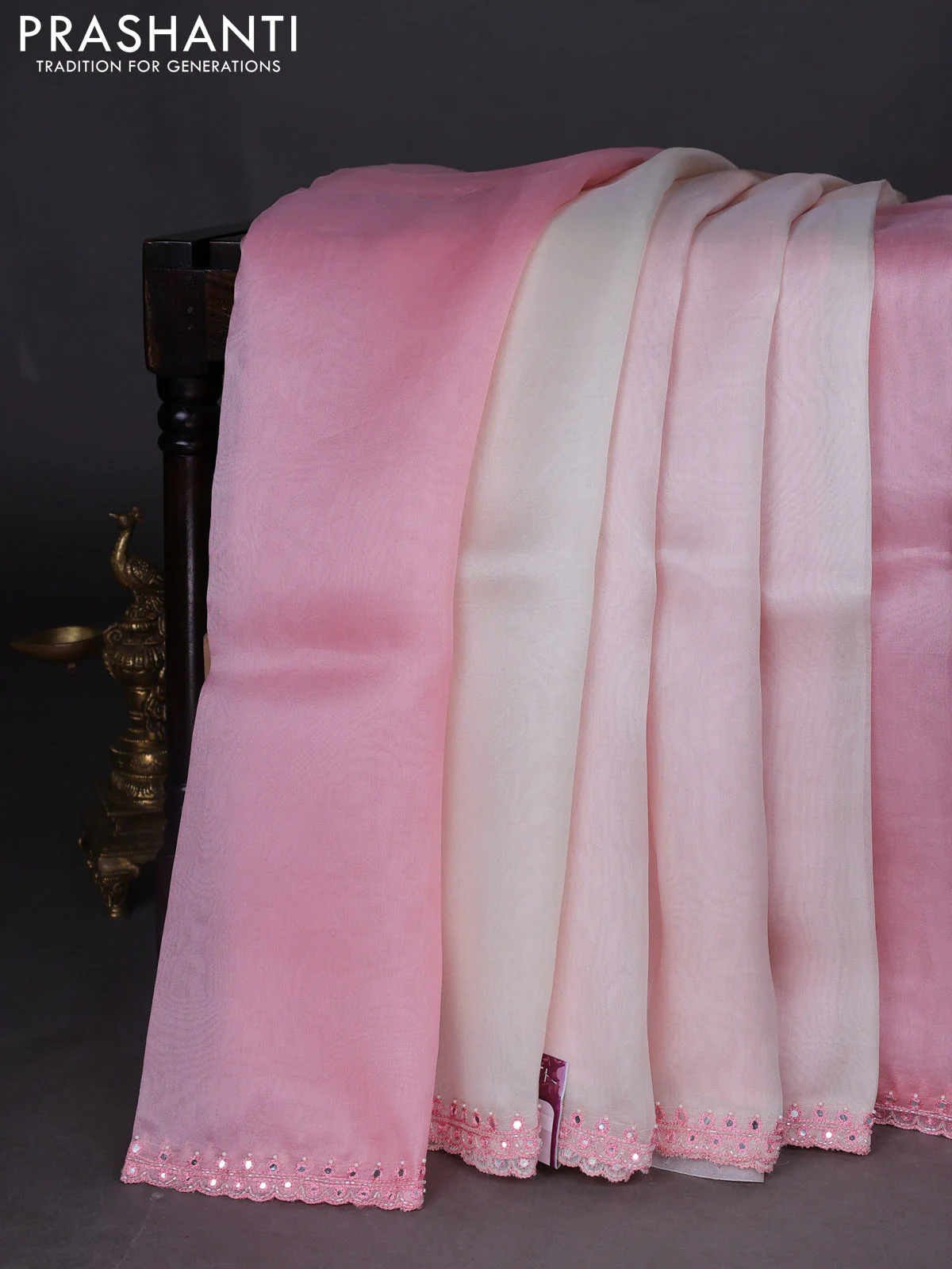 Pure organza silk saree peach pink and off white with plain body and embroidery mirror work border
