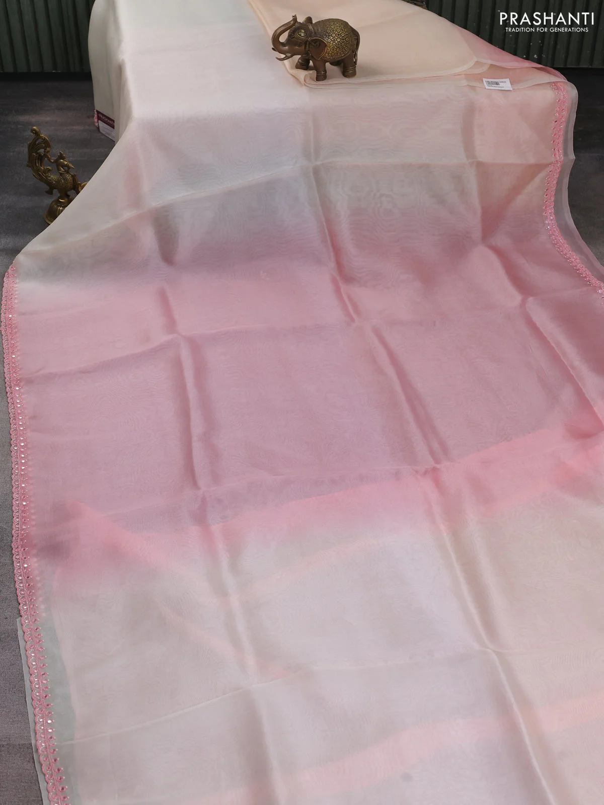 Pure organza silk saree peach pink and off white with plain body and embroidery mirror work border - Image 2