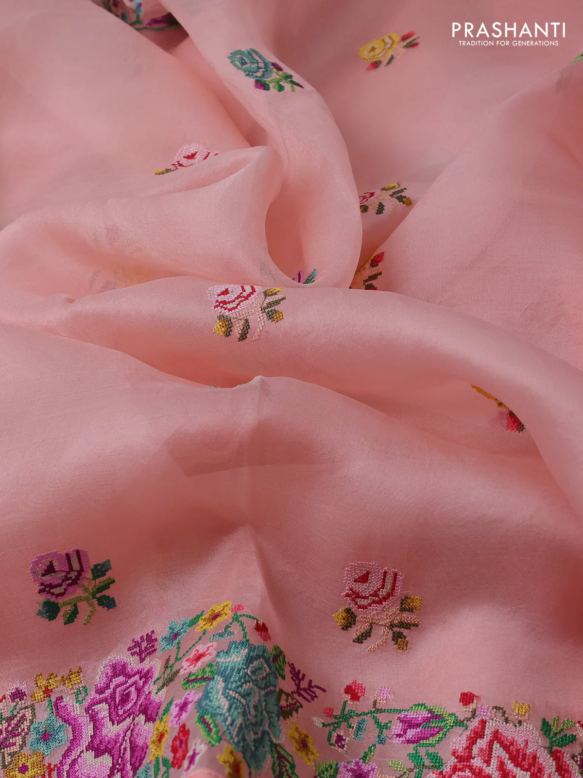 Pure organza silk saree peach shade with embroidery work buttas and floral design embroidery border - Image 3