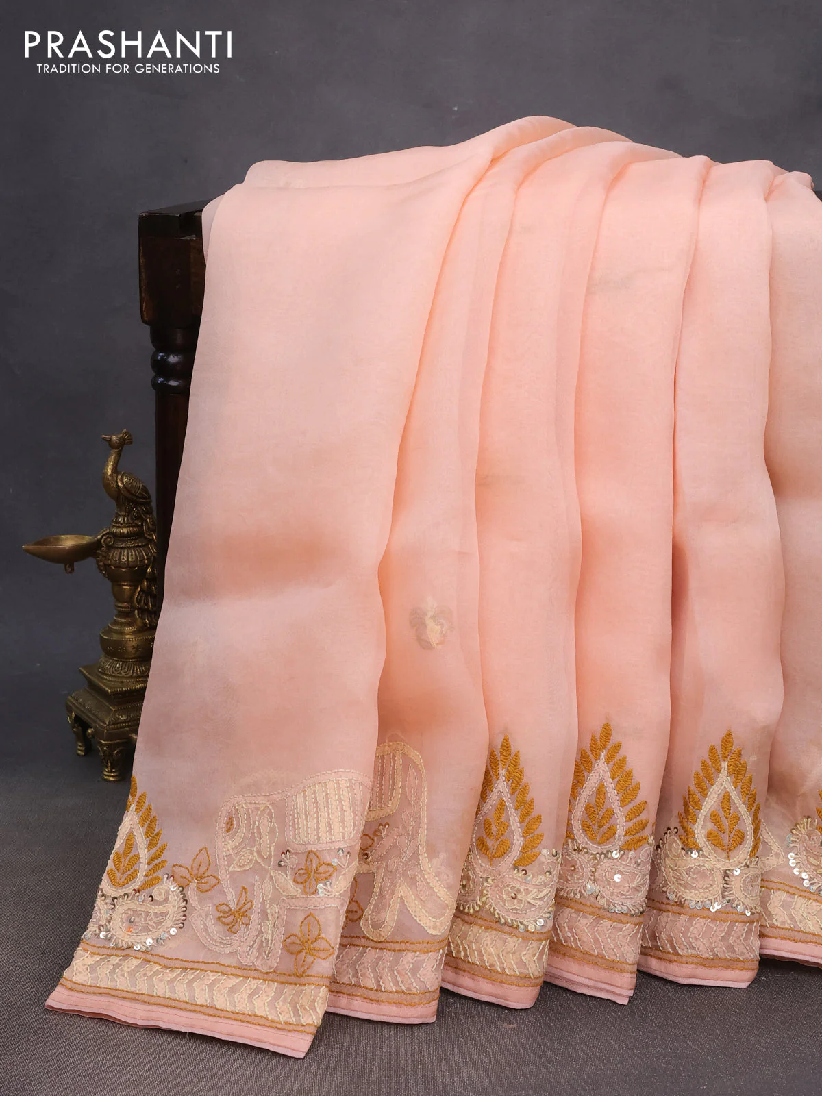 Pure organza silk saree peach shade with embroidery work buttas and kantha stitch work border