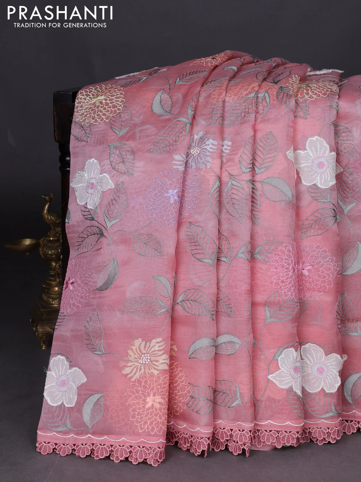 Pure organza silk saree peach shade with floral embroidery work and lace work border