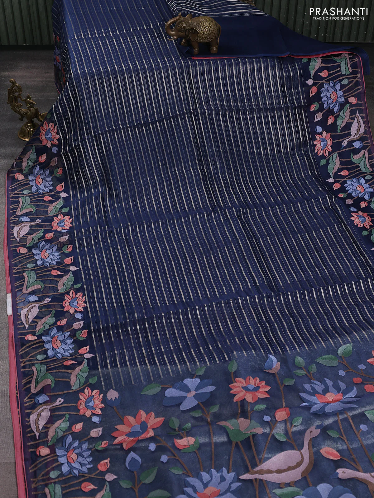 Pure organza silk saree peacock blue and peach pink with allover silver zari weaves and floral embroidery border - Image 2