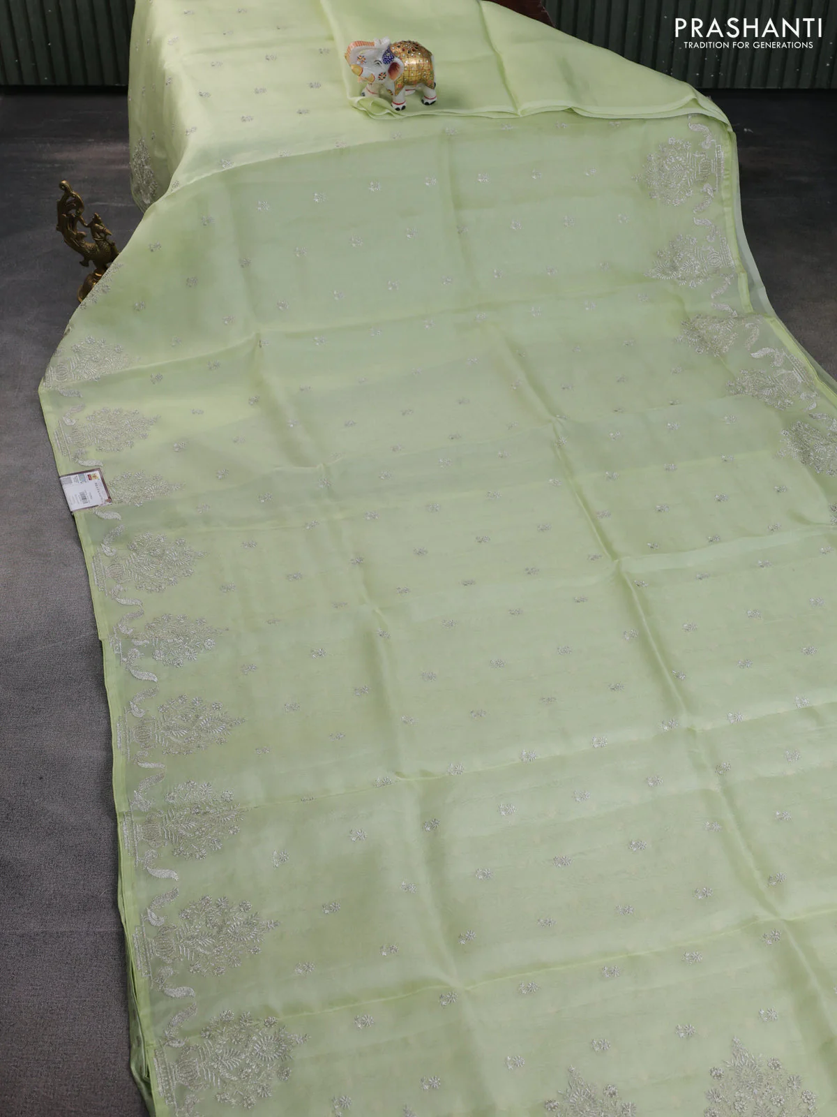 Pure organza silk saree pista green with embroidery buttas and embroidery border - Image 2