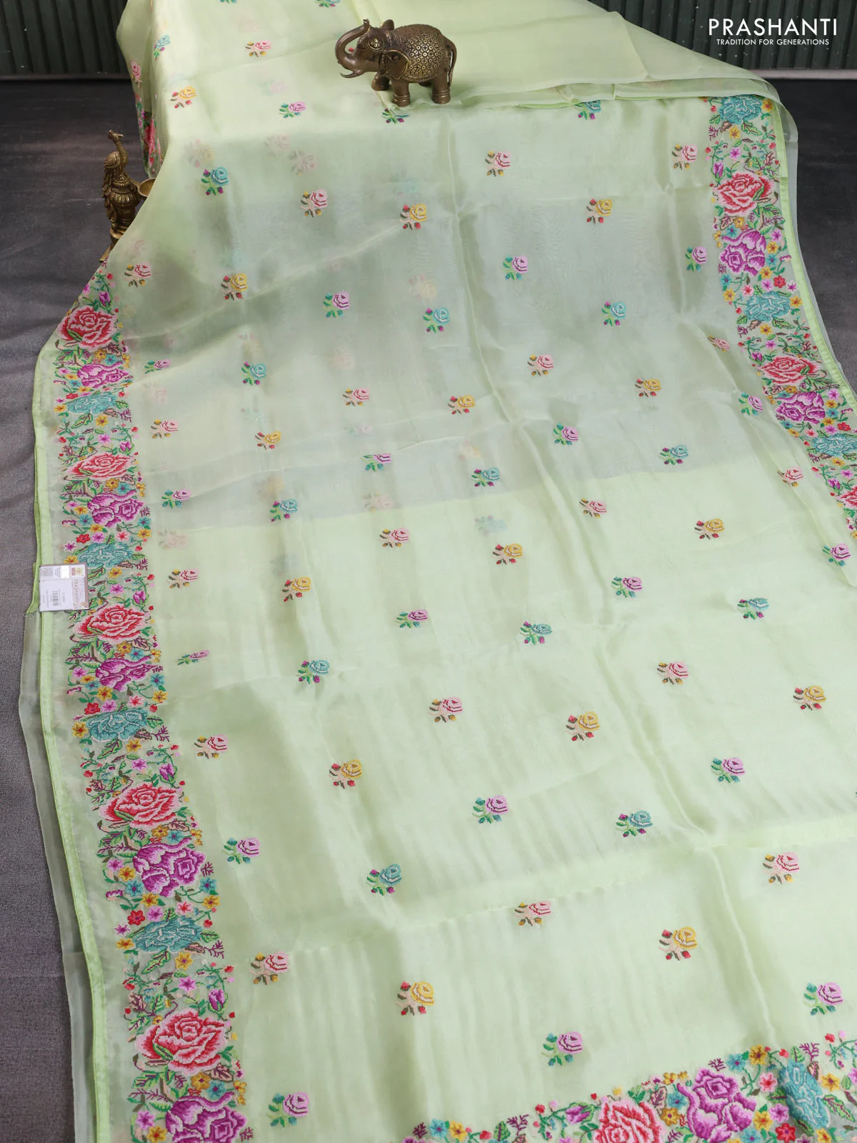 Pure organza silk saree pista green with embroidery buttas and petite embroidery border - Image 2