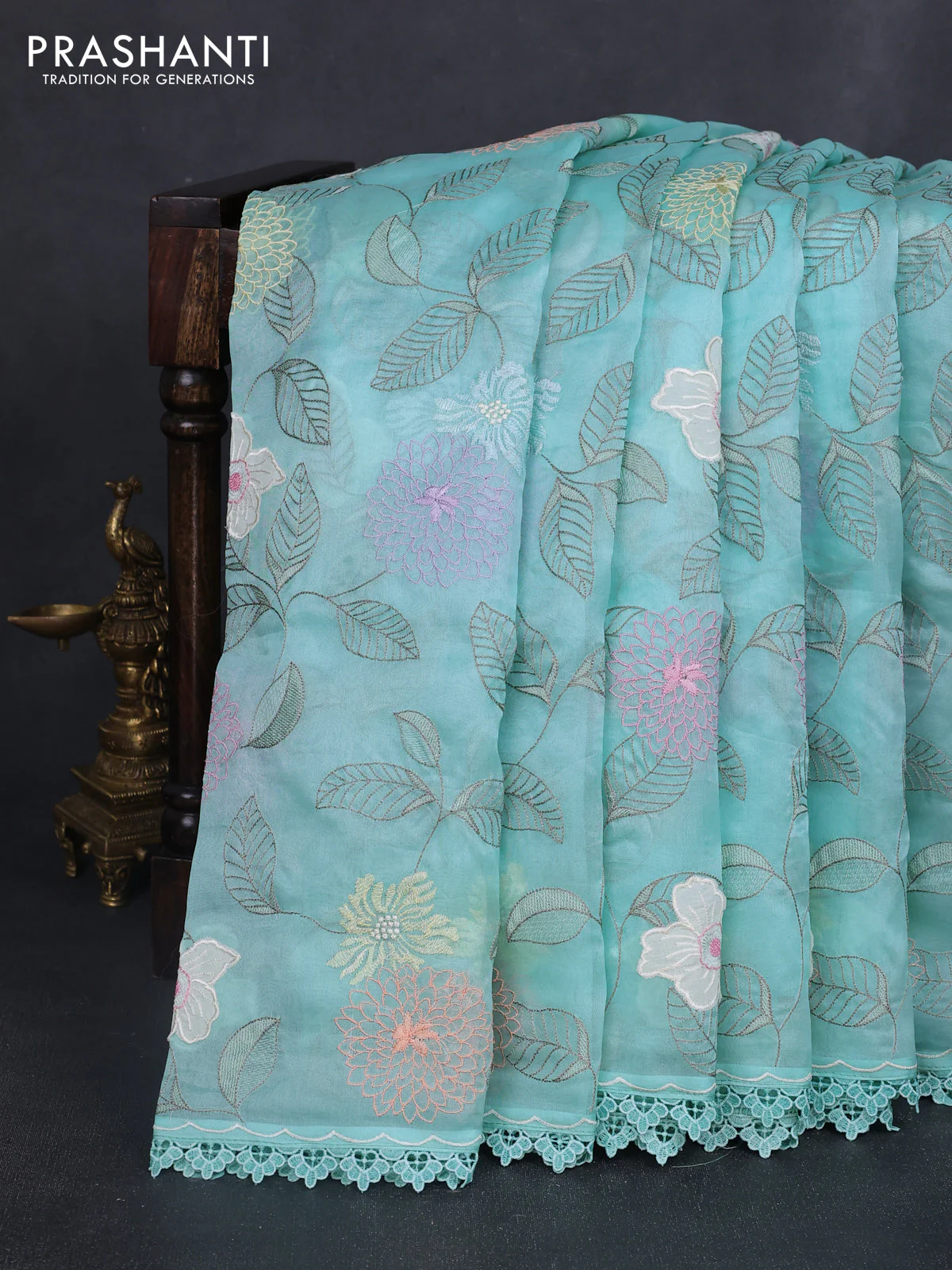 Pure organza silk saree teal blue with floral embroidery work and lace work border