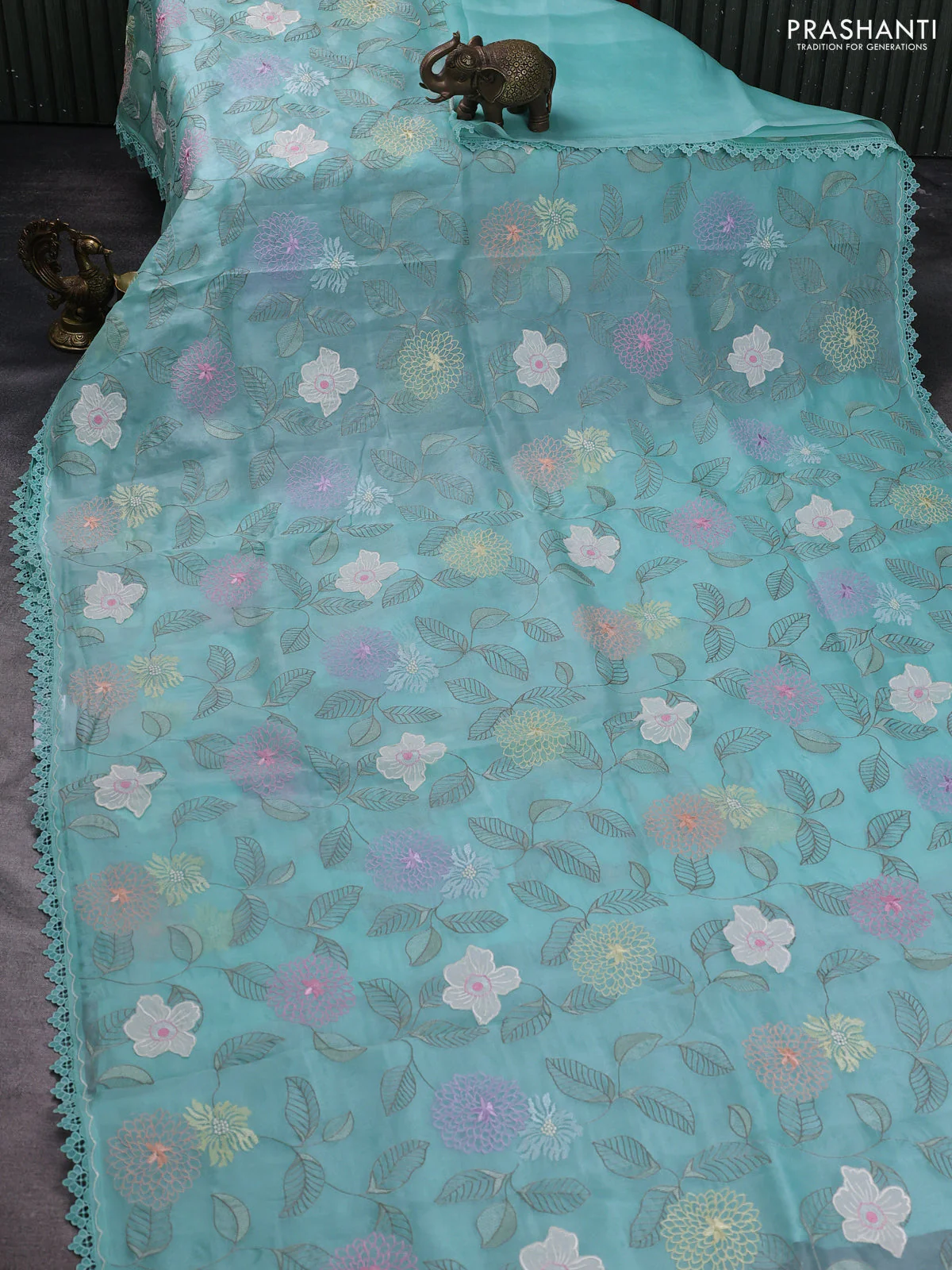 Pure organza silk saree teal blue with floral embroidery work and lace work border - Image 2