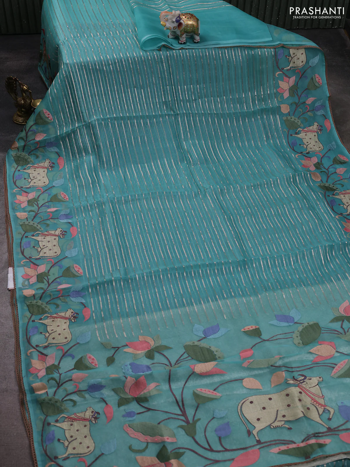Pure organza silk saree teal green with allover silver zari weaves and pichwai embroidery border - Image 2