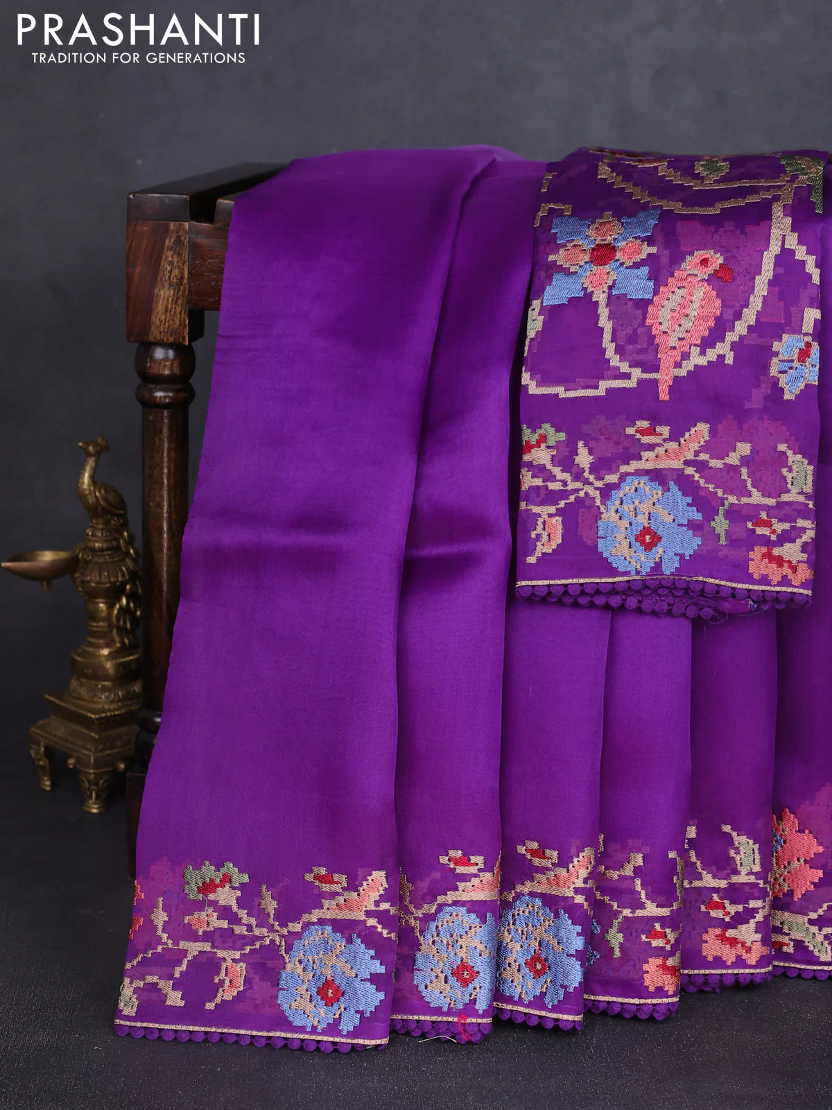 Pure organza silk saree violet with plain body and floral embroidery border