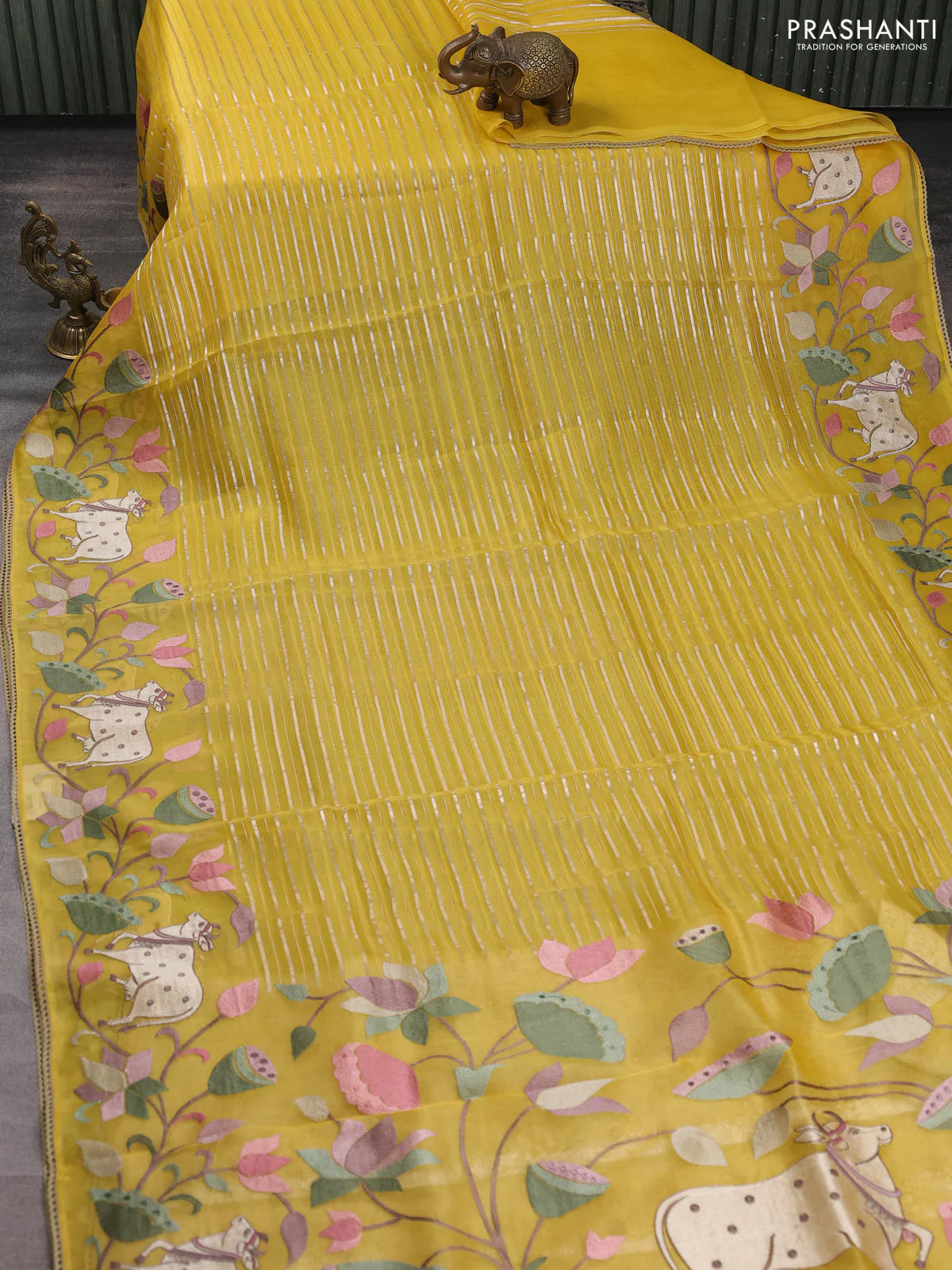 Pure organza silk saree yellow with allover silver zari weaves and pichwai embroidery border - Image 2
